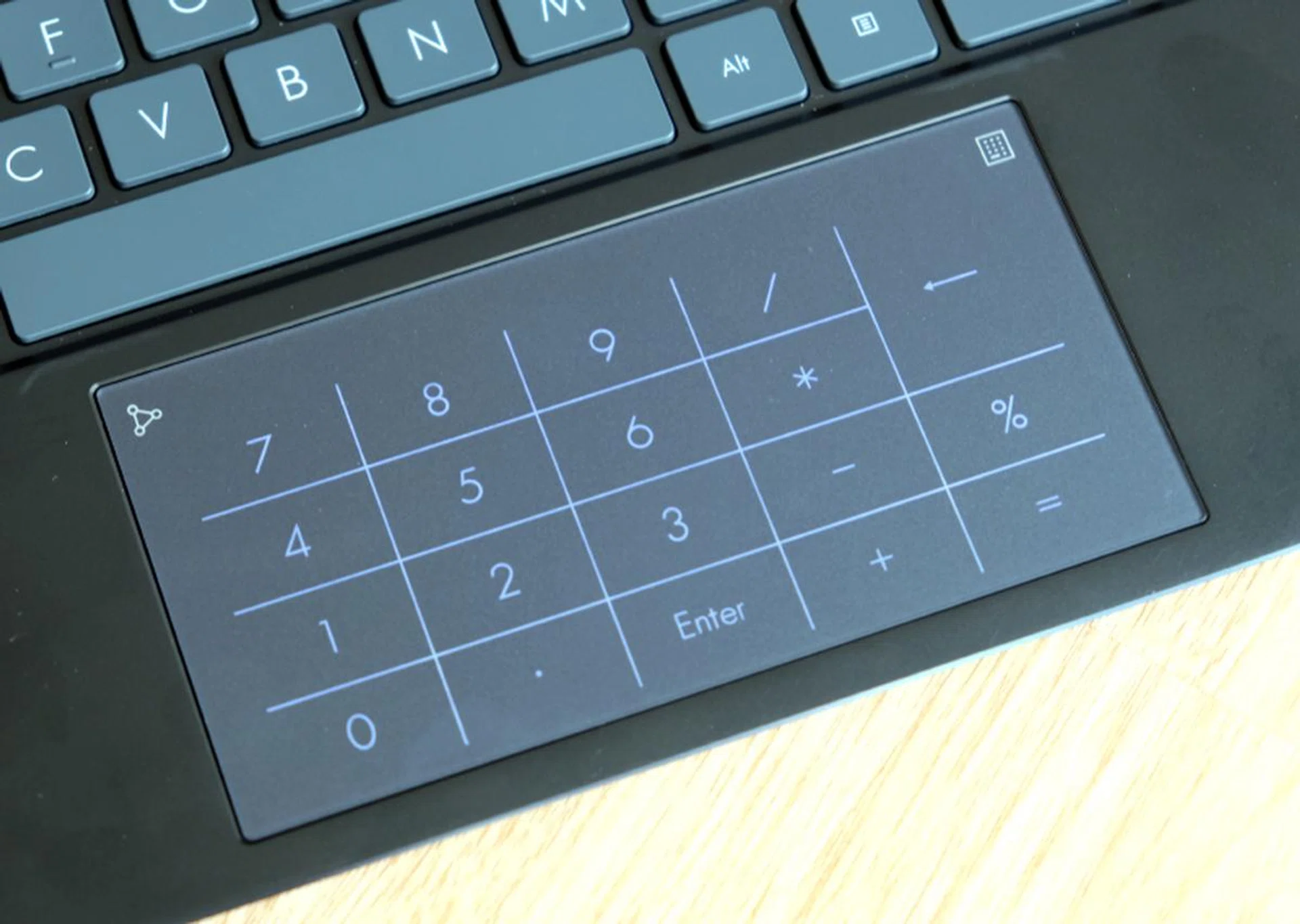 The trackpad doubles up as a virtual number pad.
