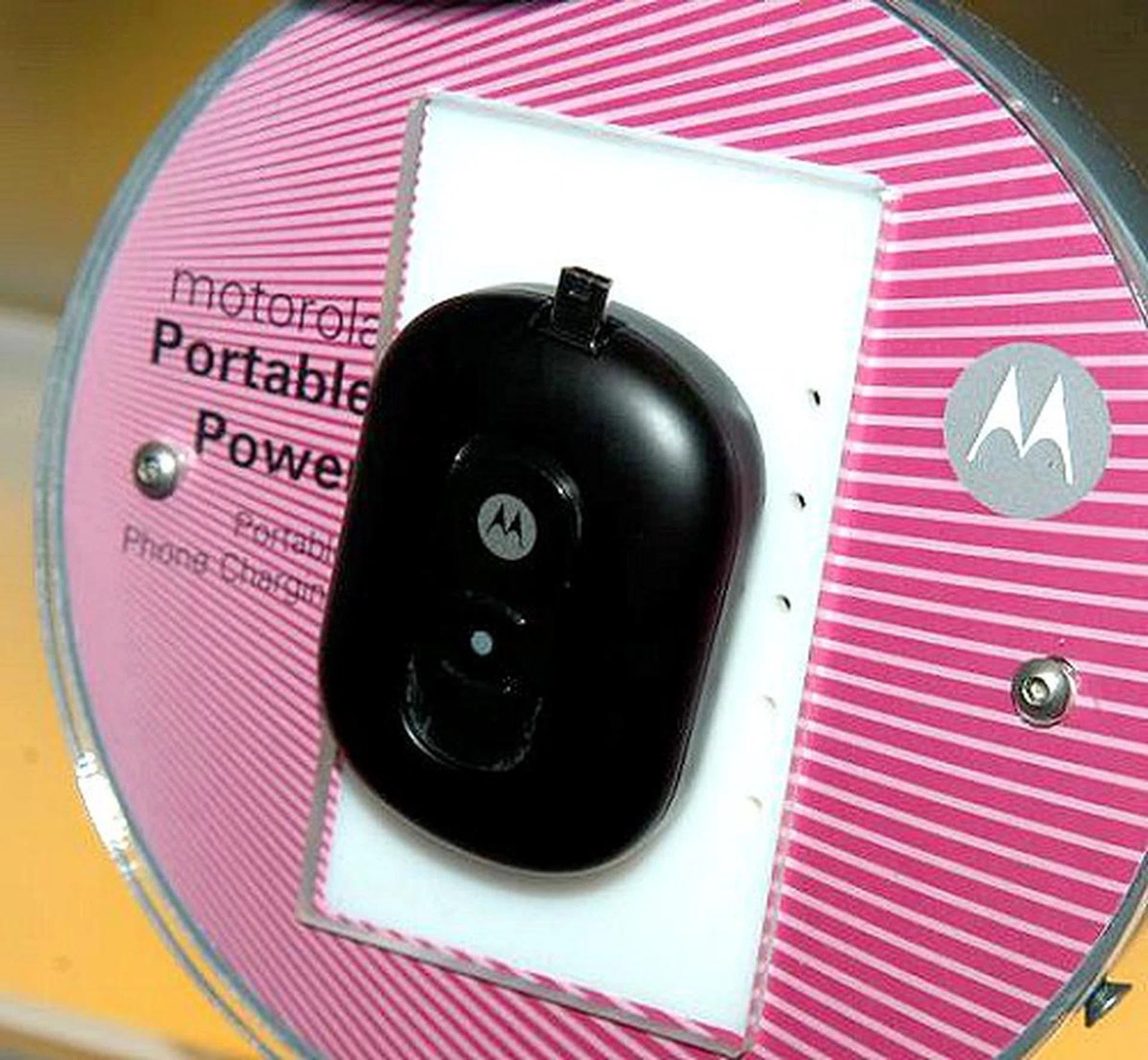 No, it isn't the PEBL handset. This is a portable battery that will give you two full charges of your Motorola phone. Just slide up the mini-USB connector and plug it in for power on the go.