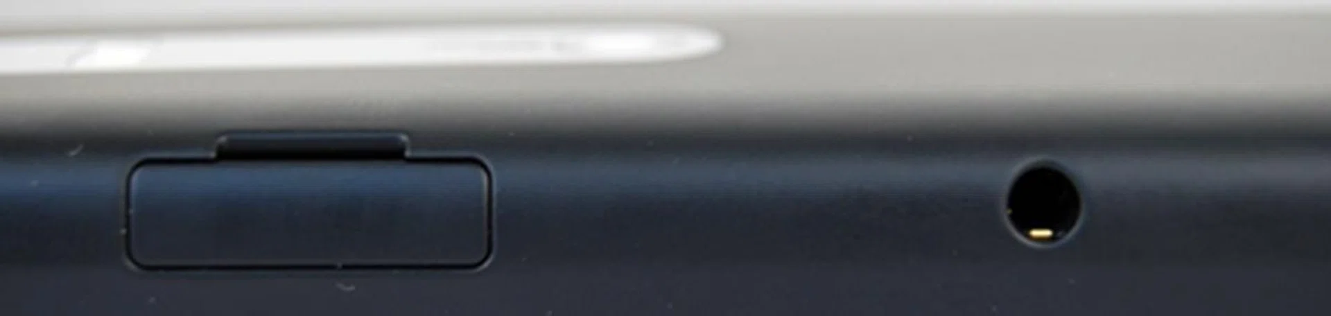  A plastic flap protects the microSD expansion and SIM card slot. 