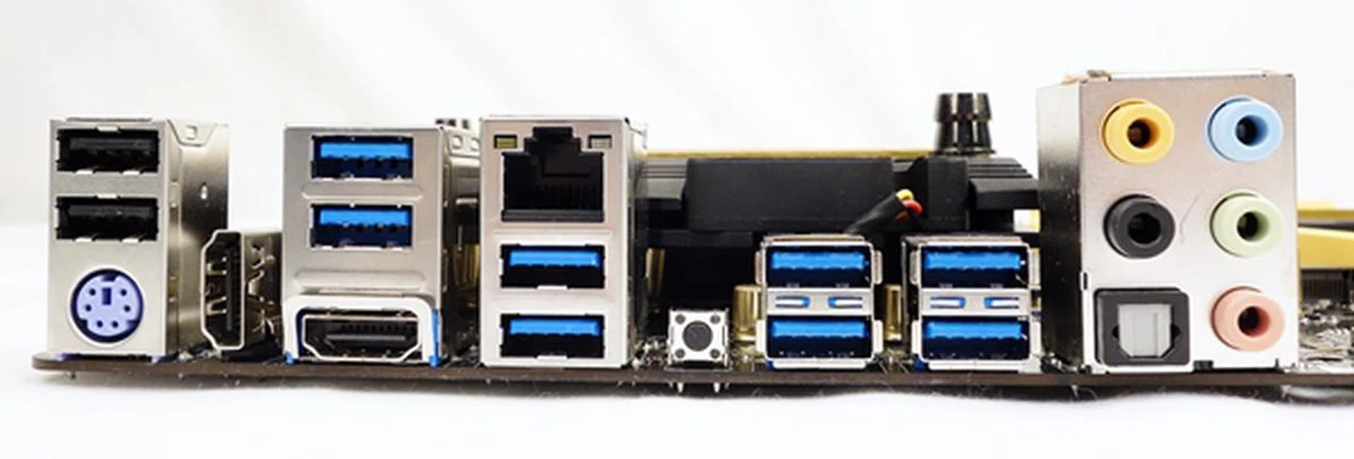 The I/O panel at the rear of the ASRock board.