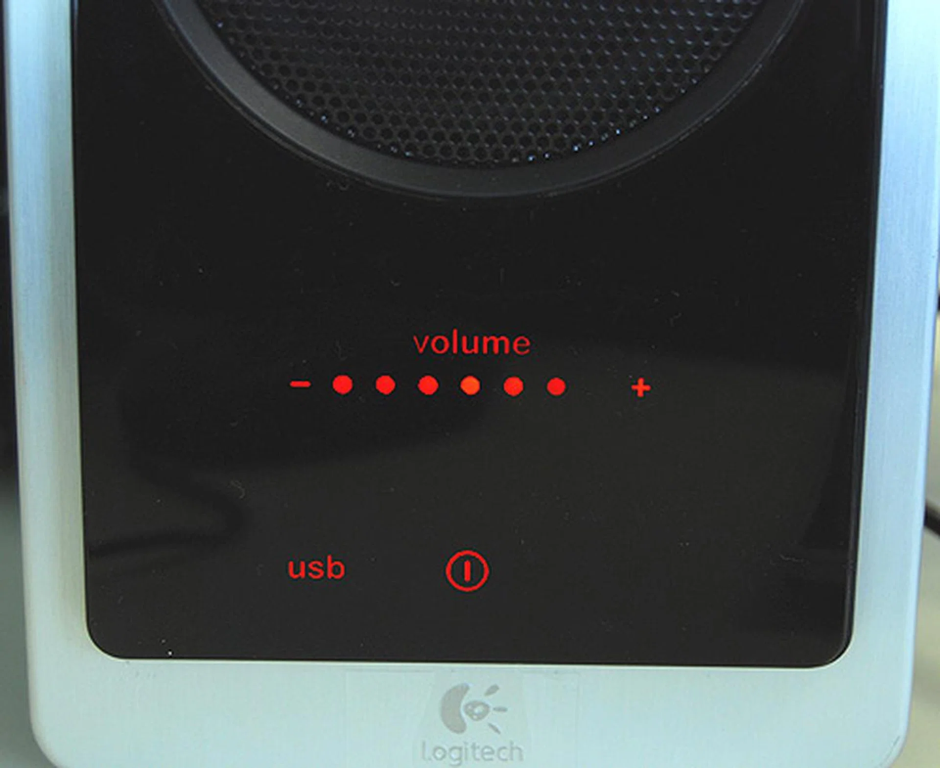 The left speakers include a display which allows you to see your volume, bass and treble levels.