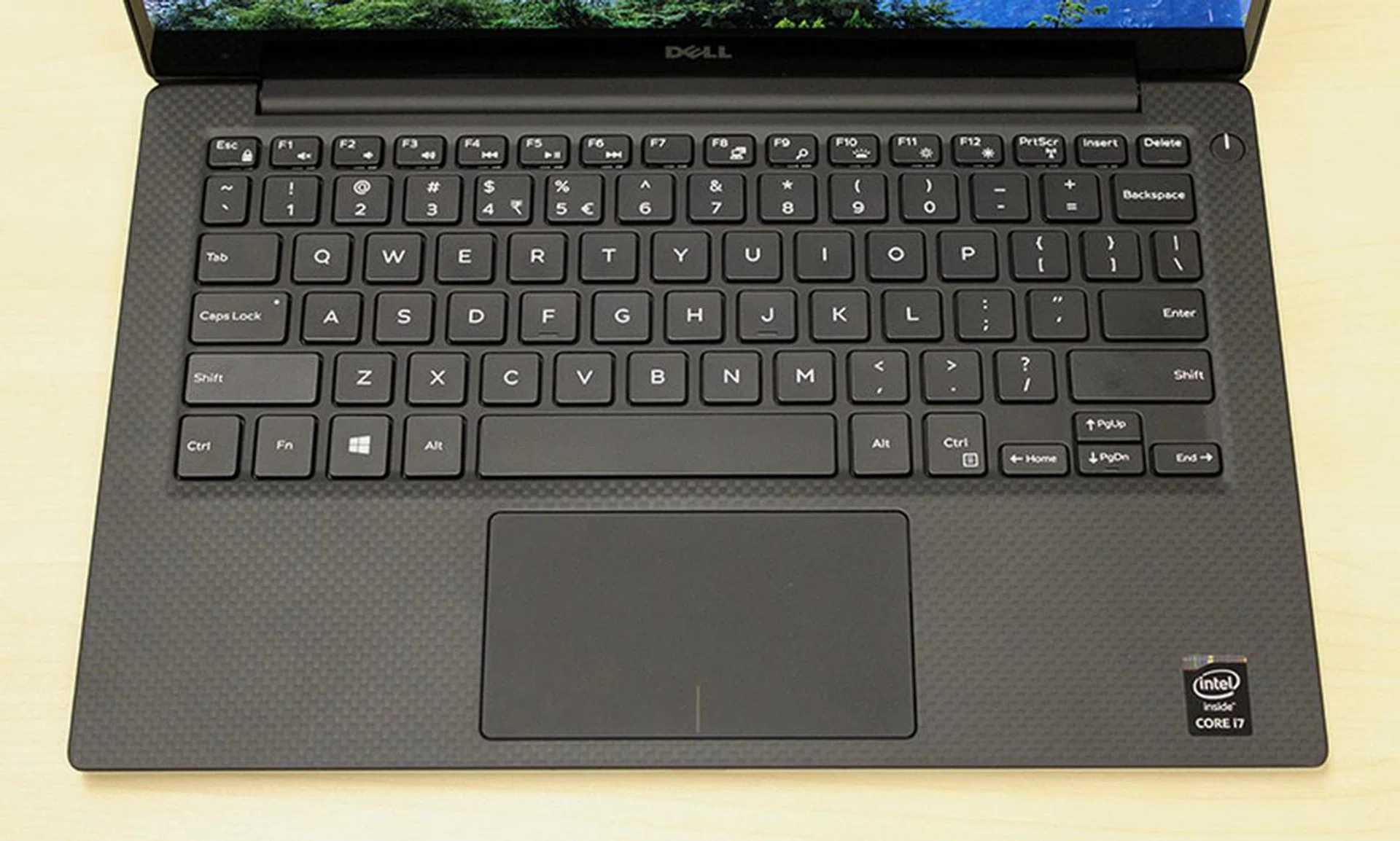 Despite the XPS 13's smaller frame, it has full-sized keys and a large trackpad.