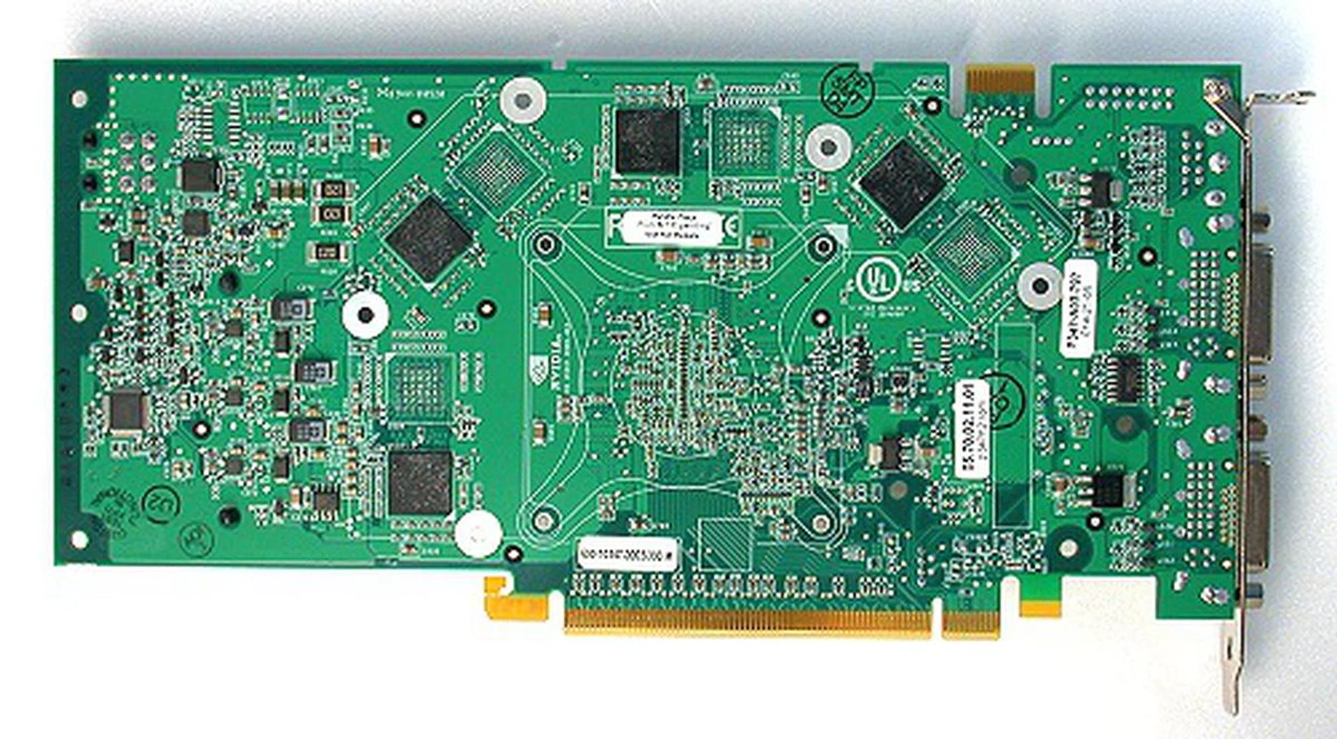 Here's the rear view with more RAM chips. We figure that NVIDIA needed to spread out the heat output and placed four ICs in front of the card and the remaining four at the rear. In case you are curious, they are the Samsung GC-16 Graphics-DDR3 memory chips rated for 1.6ns operation; nothing really new.
