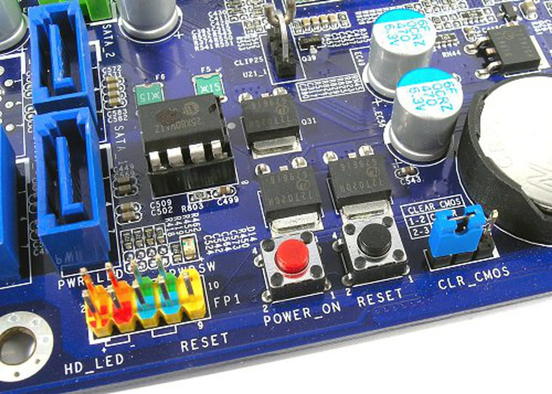 Foxconn plays the enthusiast game by including power and reboot buttons on the PCB right next to the easily reached CMOS reset jumper as well. Perhaps the P35A may be a decent budget overclocker?