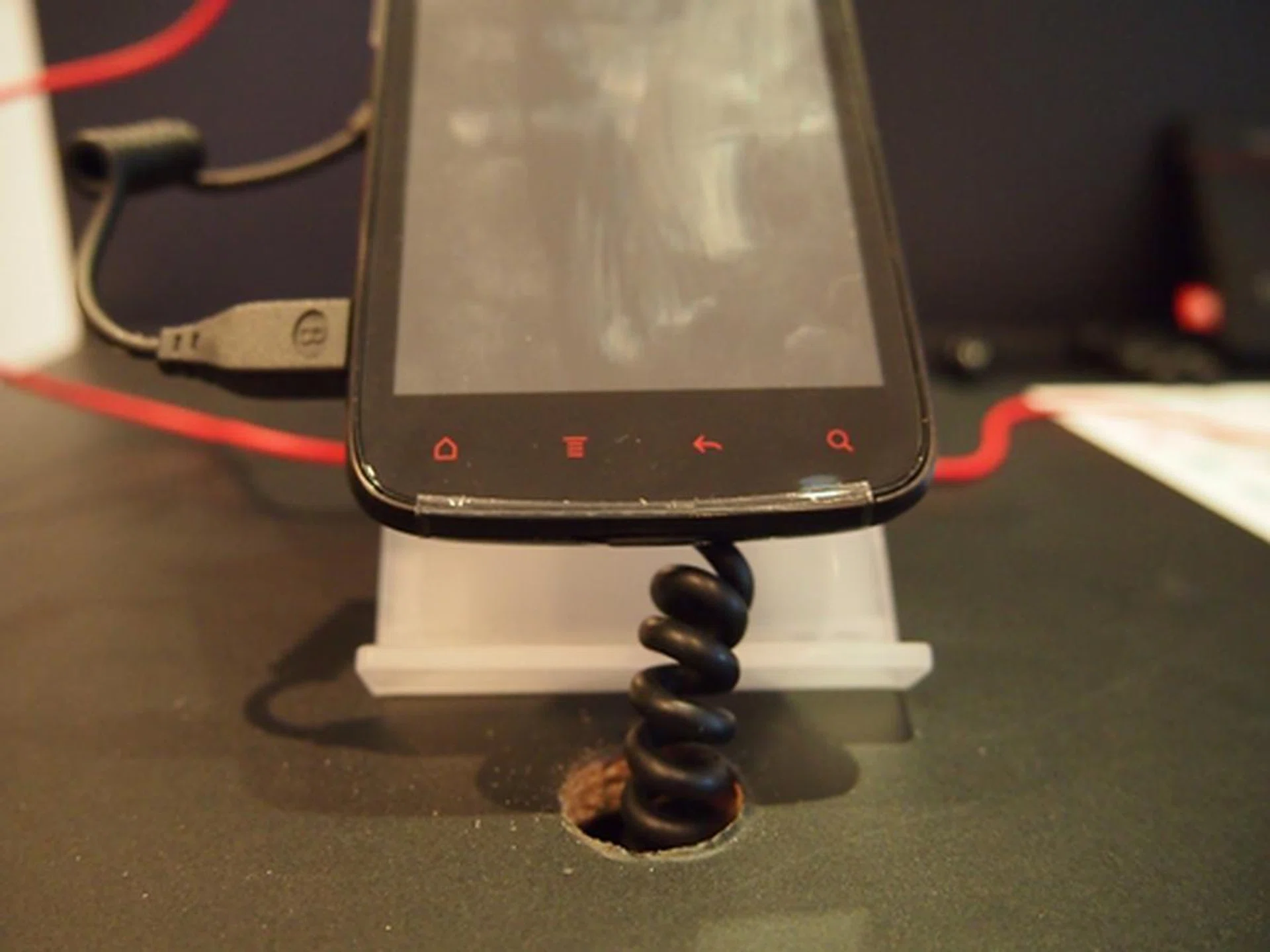 The phone shares the same dimensions with the HTC Sensation and is 3g heavier at 151g. As mentioned, the red touch buttons clearly differentiate it from its predecessor.