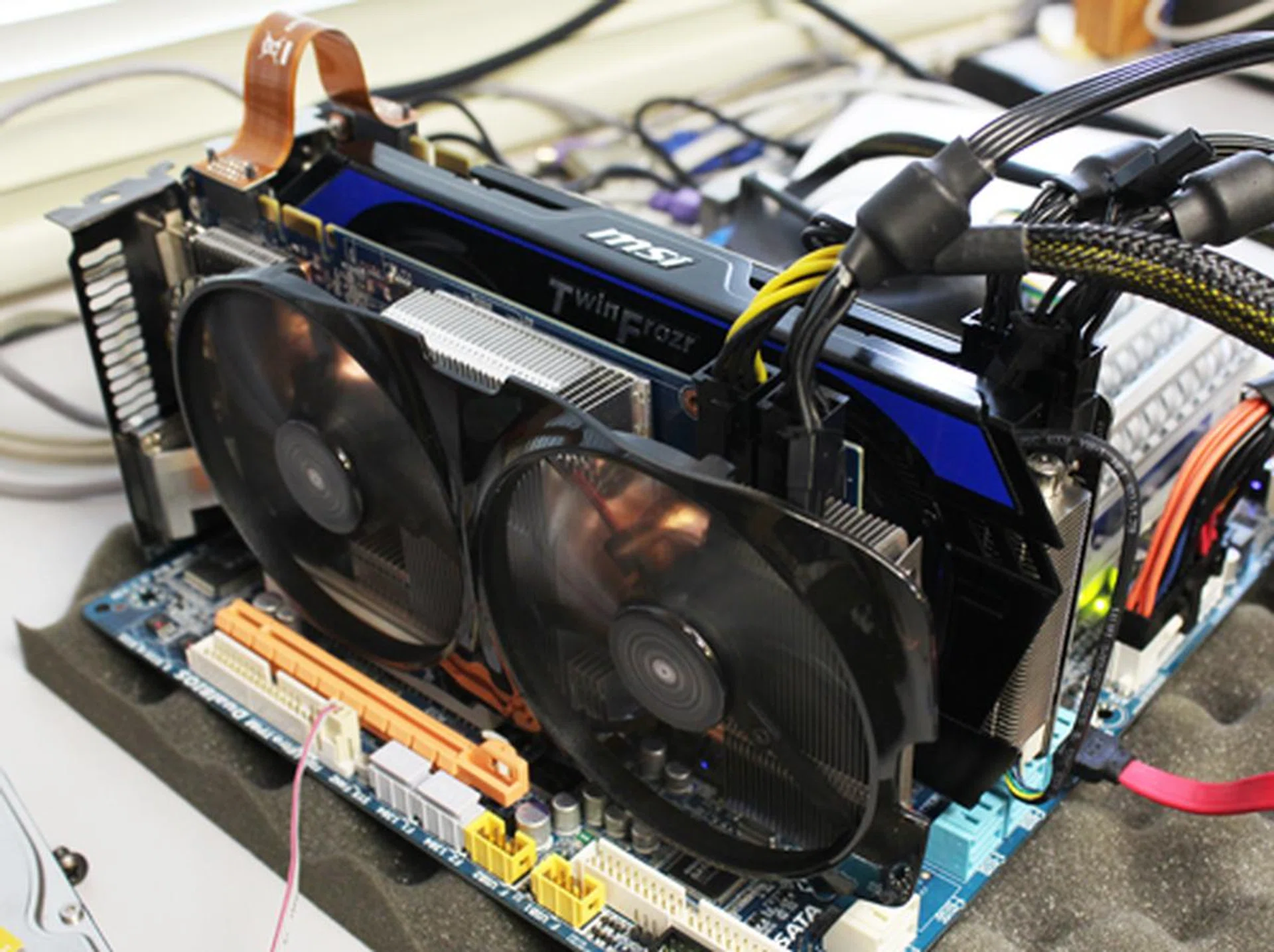 We've downclocked our MSI and Gigabyte custom models to reference specs to give you a baseline indication of how the GTX 660 Ti will perform in 2-way SLI configuration. 