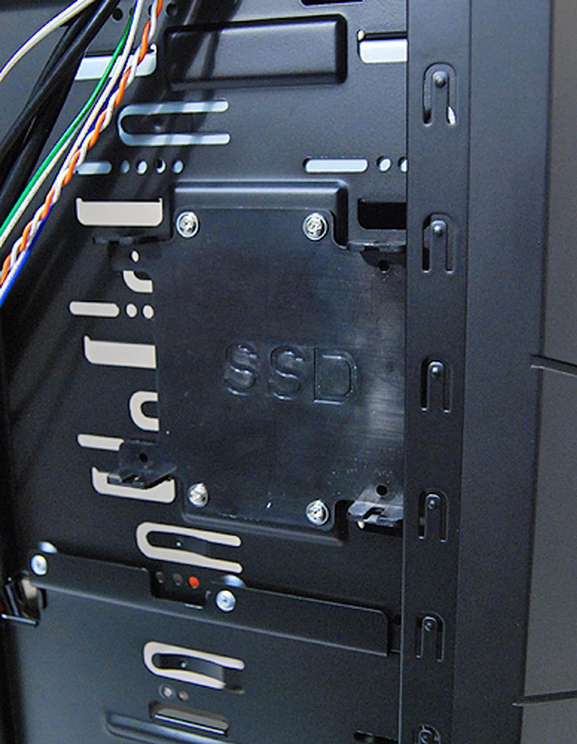 You can attach an optional SSD tray to the side of the 5.25-inch drive bays for a single SSD.