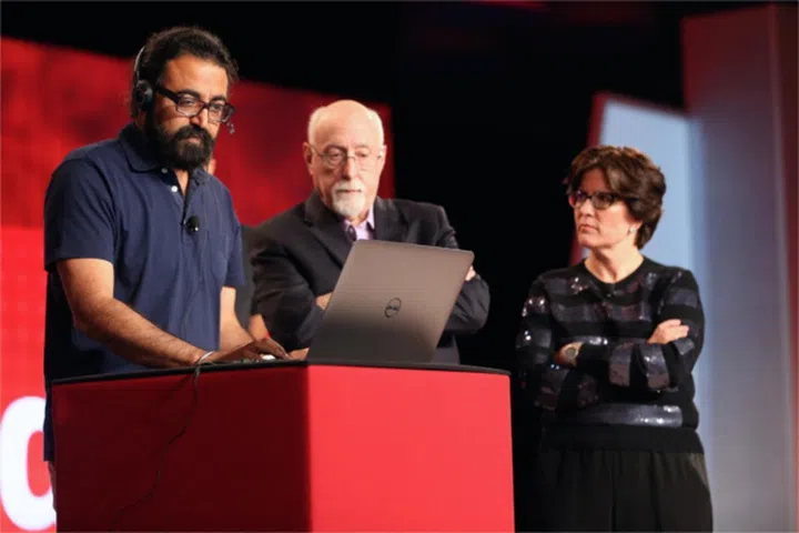 At the Code Conference, Gurdeep Pall showed the new Skype Translator app while Re/code's Walt Mossberg and Kara Swisher looked on. (Image source: Re/code..)