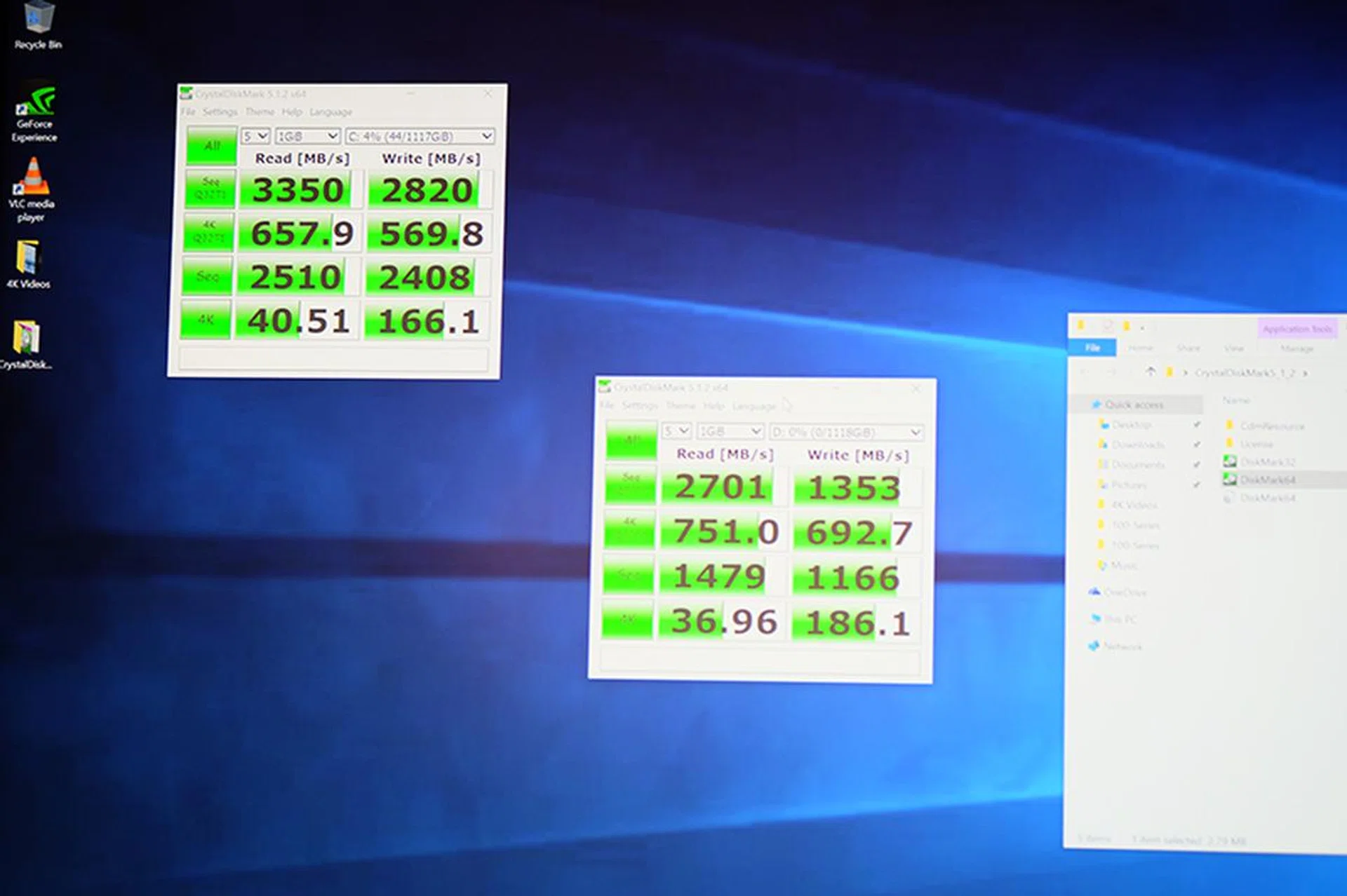 Here's a look at the CrystalDiskMark scores with three Intel 750 series SSDs in RAID 0 (top left).