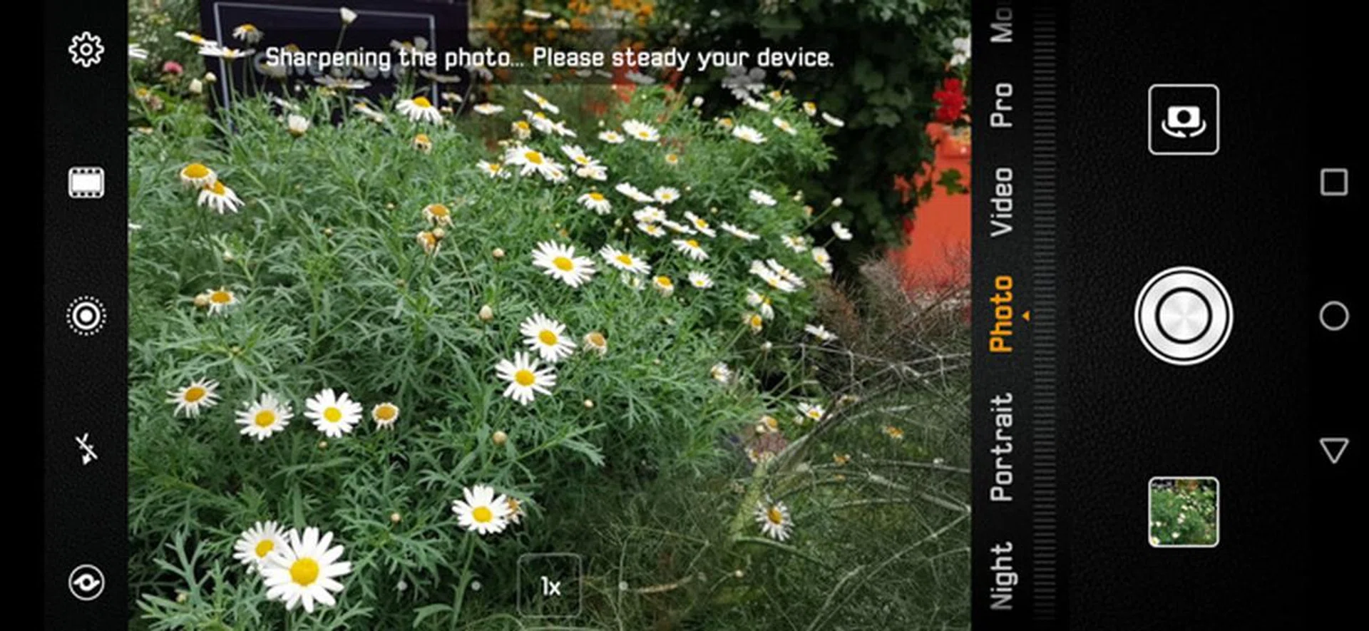 The camera will prompt you to hold steady when it's performing sharpening.