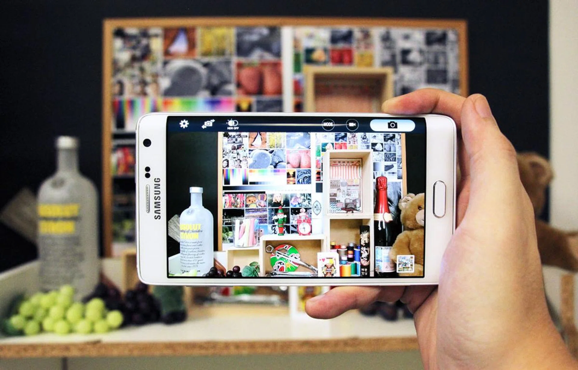 The camera app puts all of the menu options on the curved section of the screen, letting you see more on the main viewfinder.
