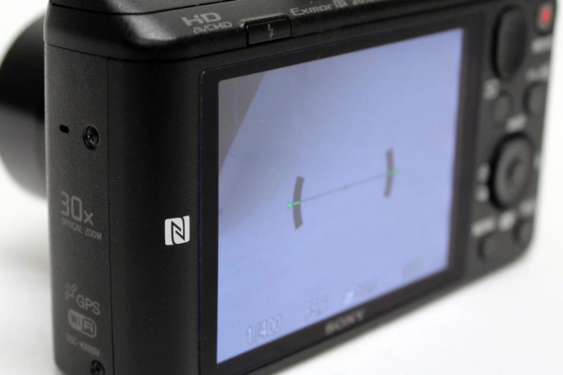While the NFC logo is beside the rear display, we found out that you will have to tap your smartphone on the camera's side to start up the connection.