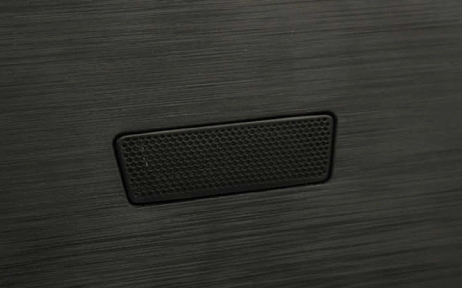 Flip the Y500 over and you'll find its small built-in subwoofer. It's probably not much more than a separate speaker taking care of the low frequency, but it helps a bit.