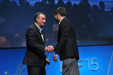 Intel CEO Brian Krzanich is joined on stage by Rockchip CEO Min Li at IDF 2015 in Shenzhen, China. (Image Source: Intel)