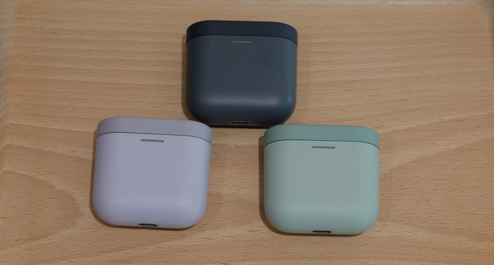 In clockwise direction from the top: Storm Grey, Sage Green, and Spring Lilac.