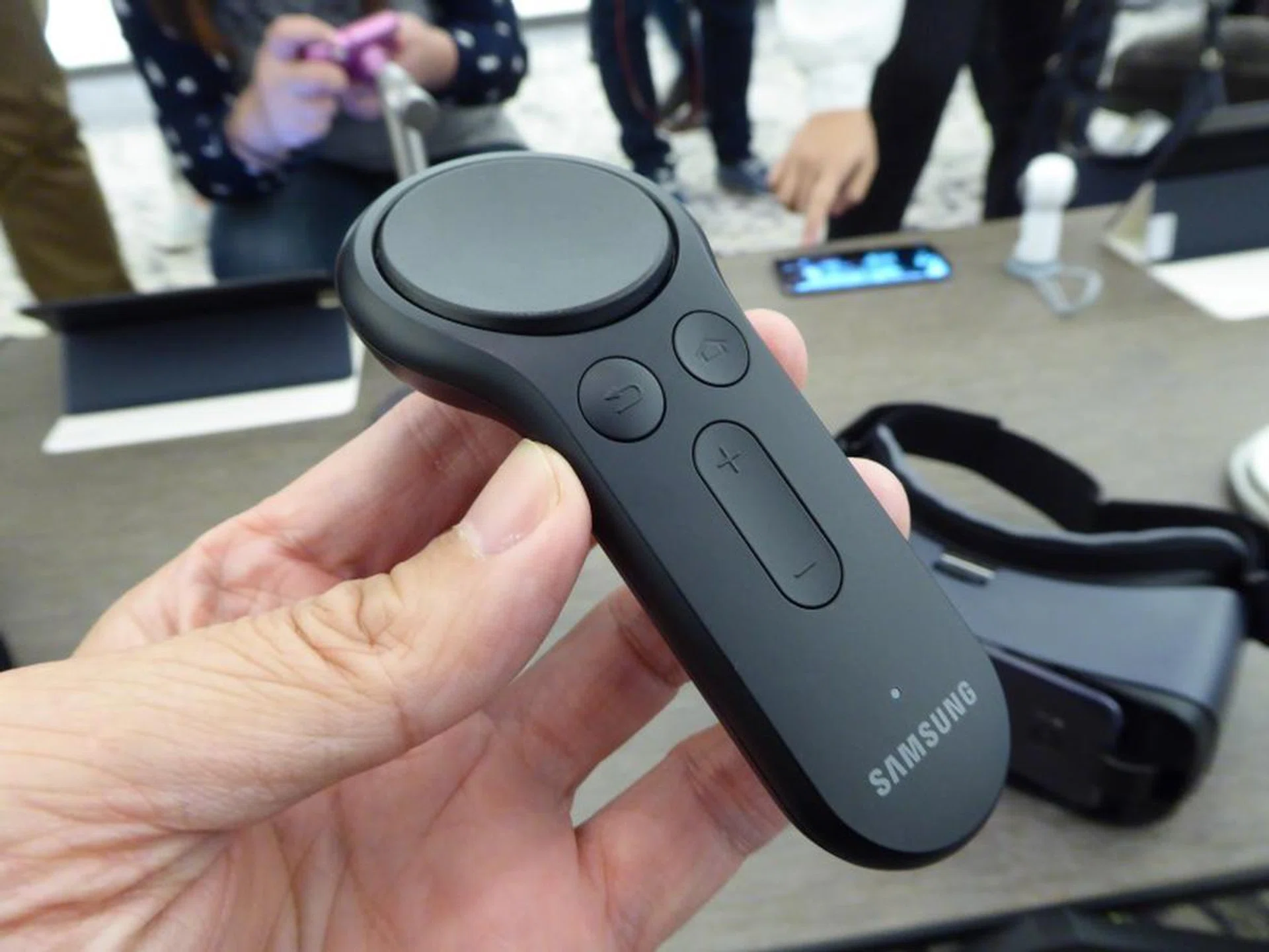 The new Gear VR Controller with control buttons as well as a thumb pad joystick.