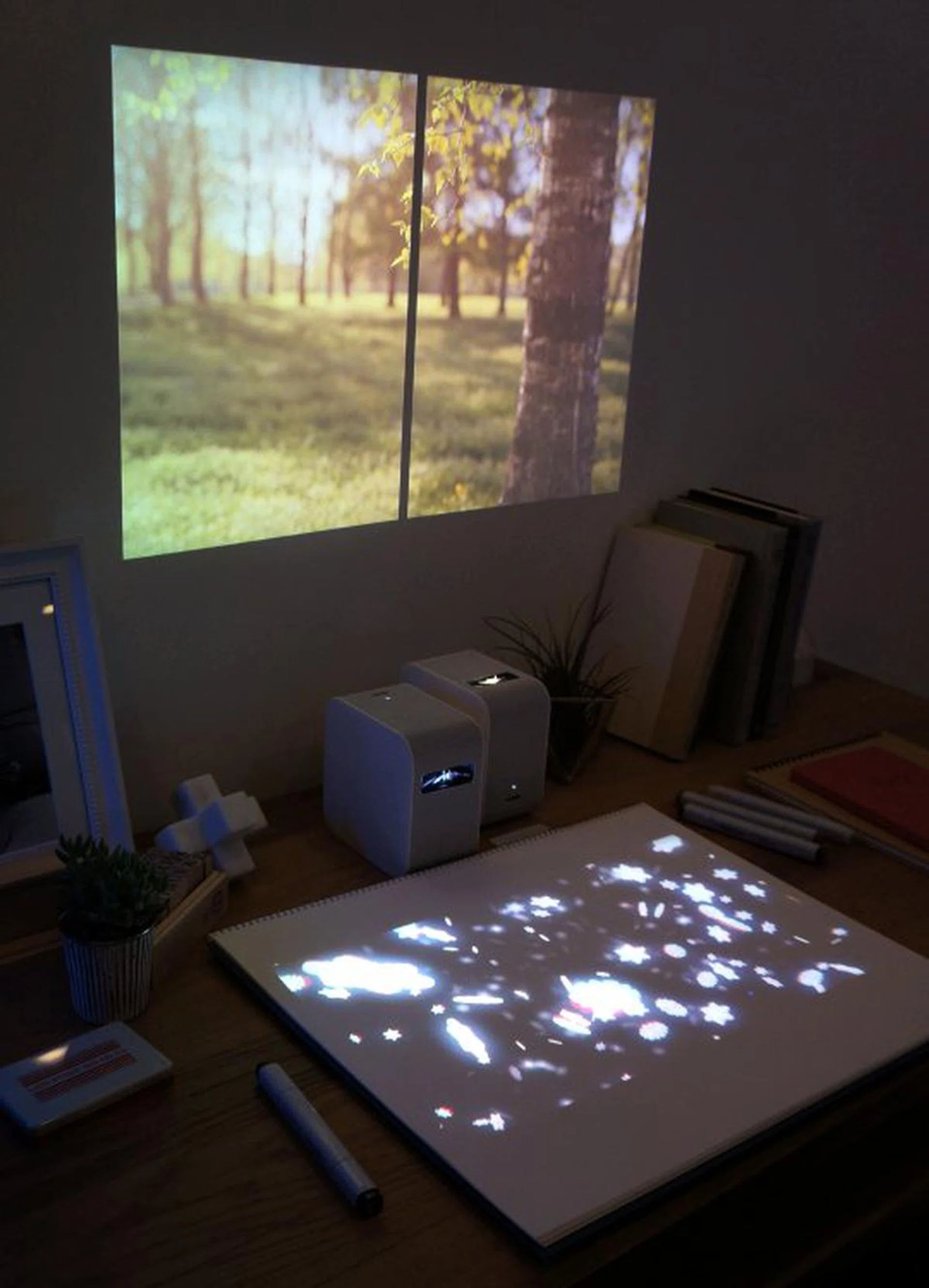 Here’s a compact and portable ultra short throw projector that can throw an image up to 80 inches in size on to any adjacent surface – be it a wall or a table. It’s also equipped with internal speakers and a battery for true portability.