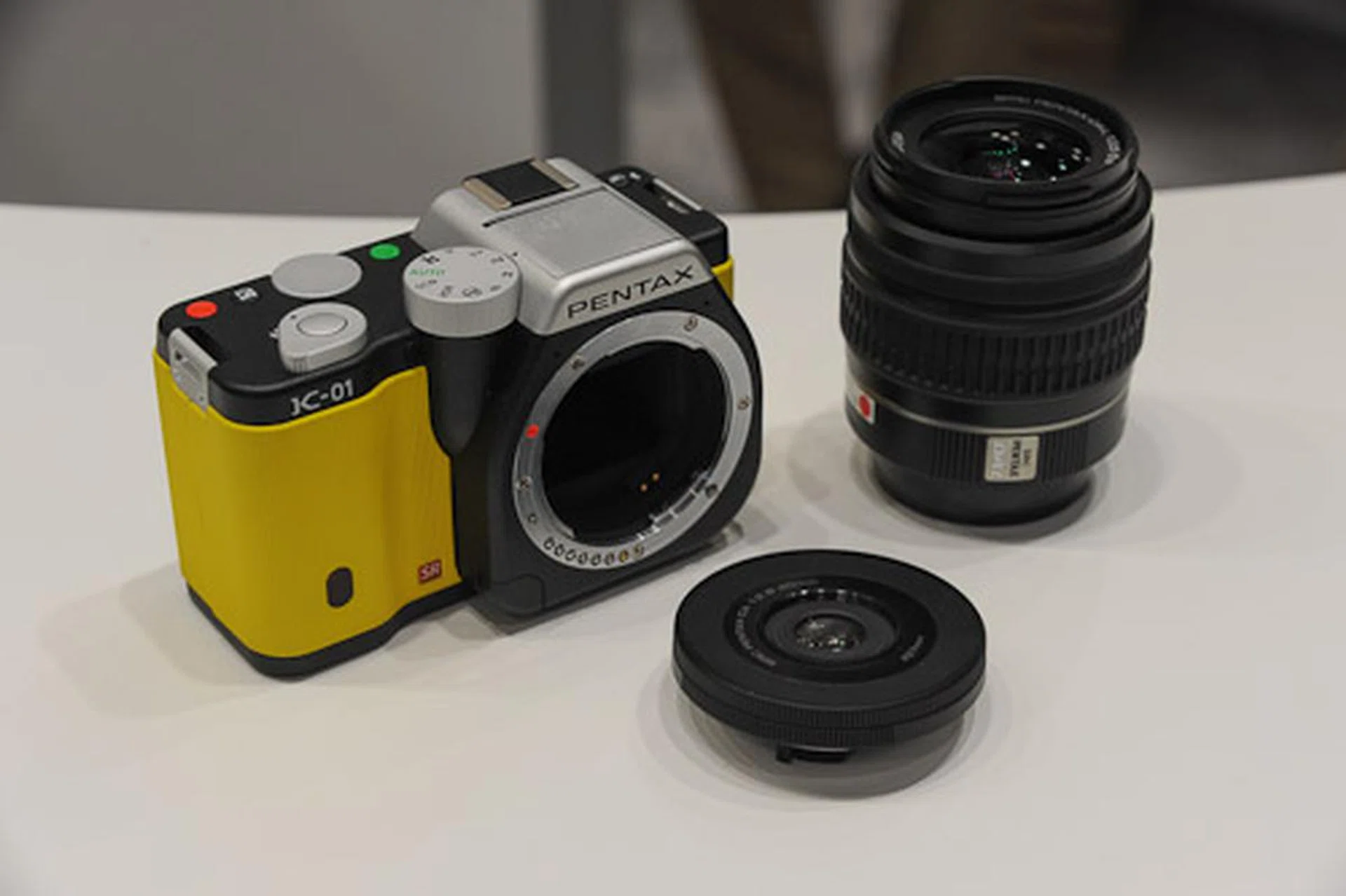The Pentax K-01 is rather fat. Its new pancake lens is amazingly thin though.
