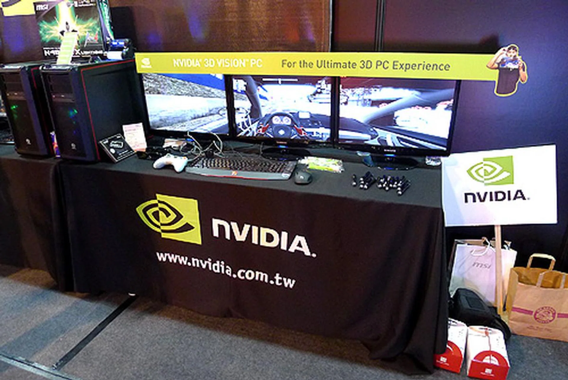 Co-sponsors NVIDIA showing off their 3D Vision Surround setup.