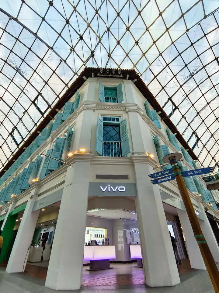 The store's facade faces ground-level shoppers in the heart of Bugis.