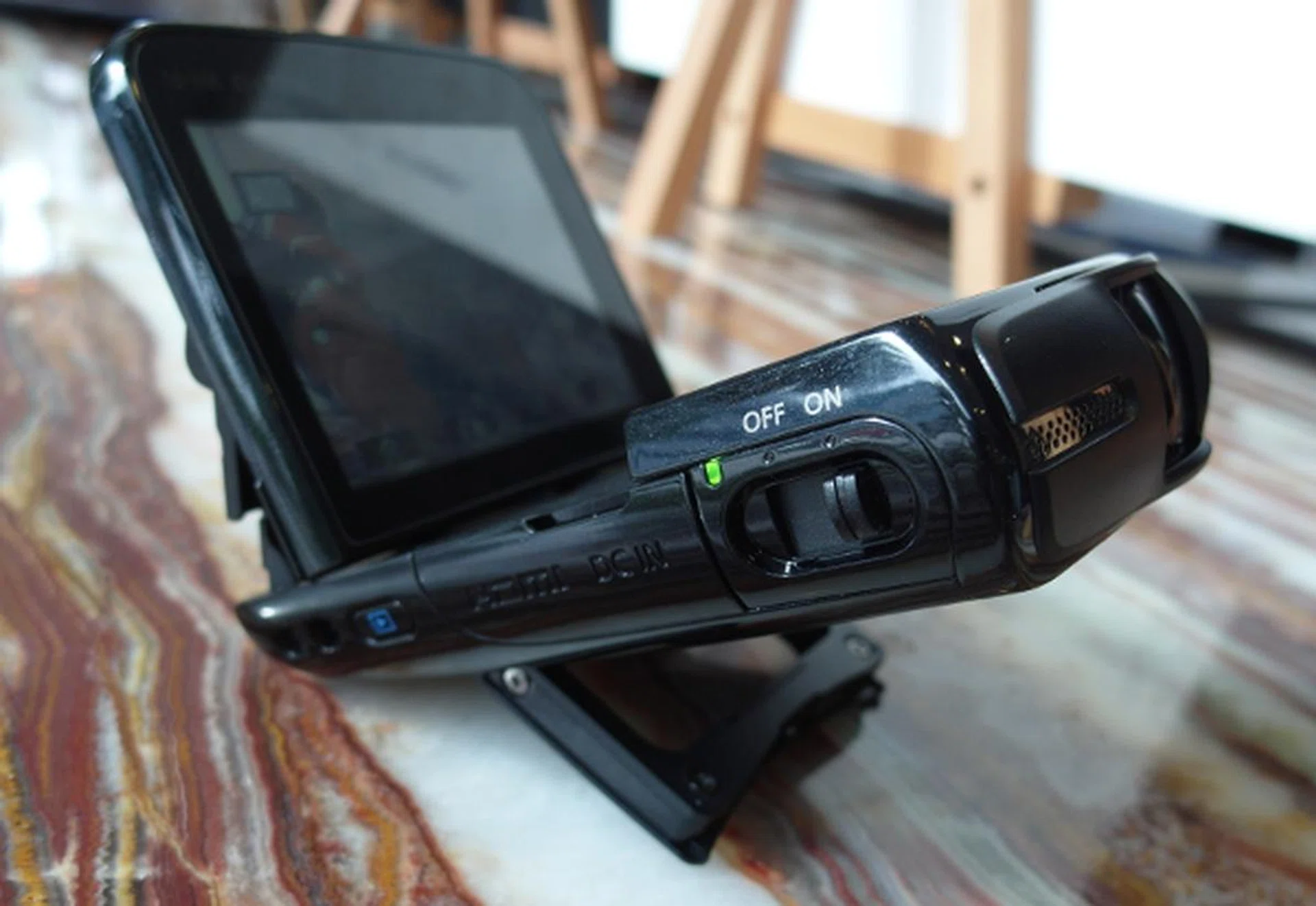 The Legria Mini comes with a built-in stand so you can adjust the lens' angle of elevation, making it useful for recording videos when placed on the ground or other  surfaces.