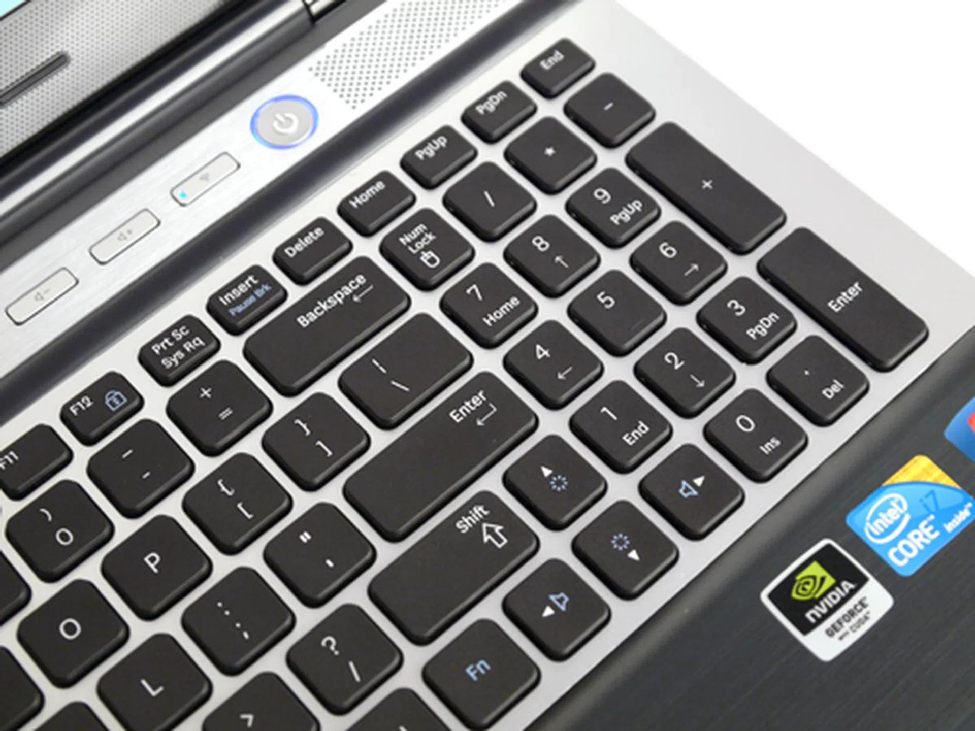 We like the notebook's two-toned scheme and generously pitched chiclet keys. However, we have the tendency to hit the Home key when we meant to punch the Delete key. The WiFi button (toggles Bluetooth and WiFi) is the one just next to the power button.