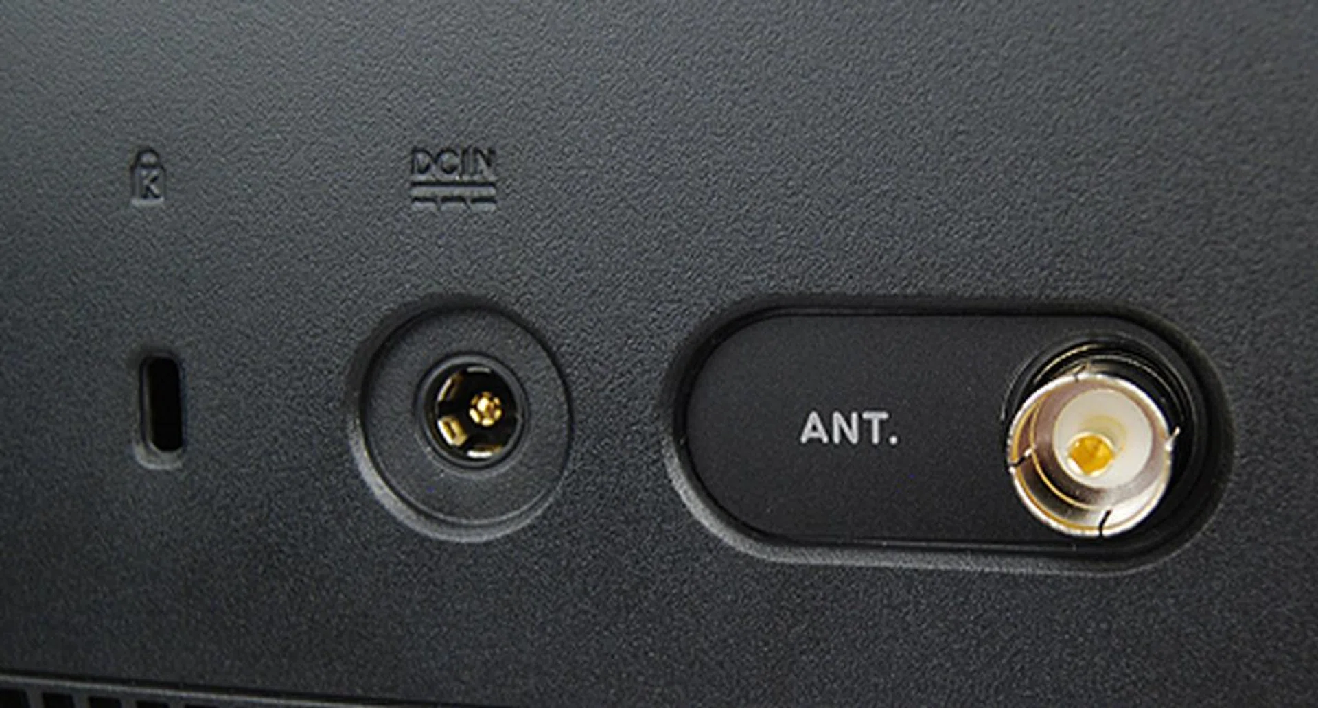 On the left side of the rear panel, there's a Kensington lock slot, DC-in to power the machine and also the antennae coaxial jack for using the integrated TV tuner.
