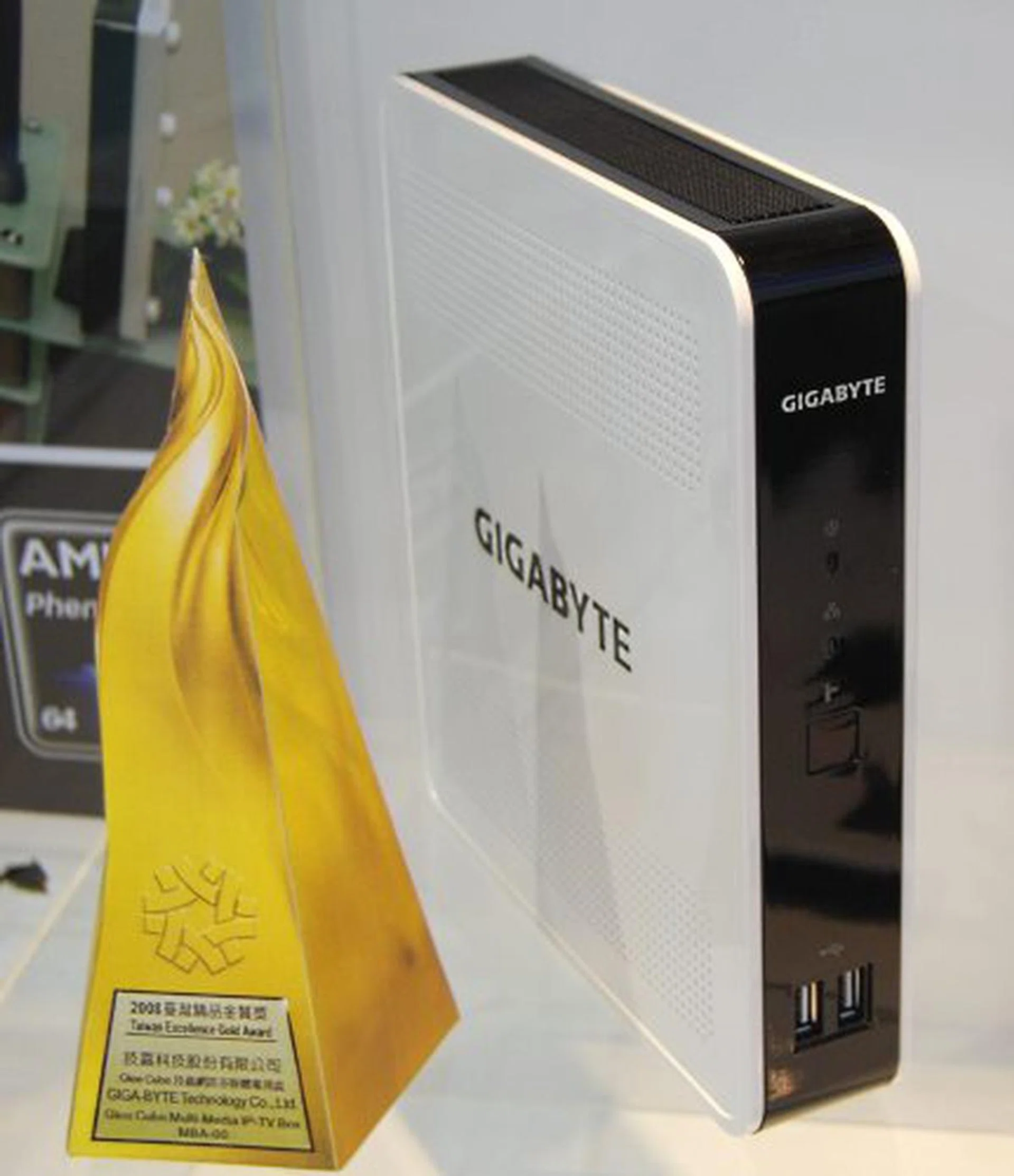 Another segment that's being pursued by quite a few vendors now is that of the multimedia networked IP TV box, which allows one to watch local TV channels even when in a foreign country via the Internet. Gigabyte's answer is the GleeCube, which allows even a PDA to access the TV programs recorded or streamed using the GleeCube (connected to both the TV cable and router). With a video/security camera, you can also monitor your home from aboard using this device as the go-between.  