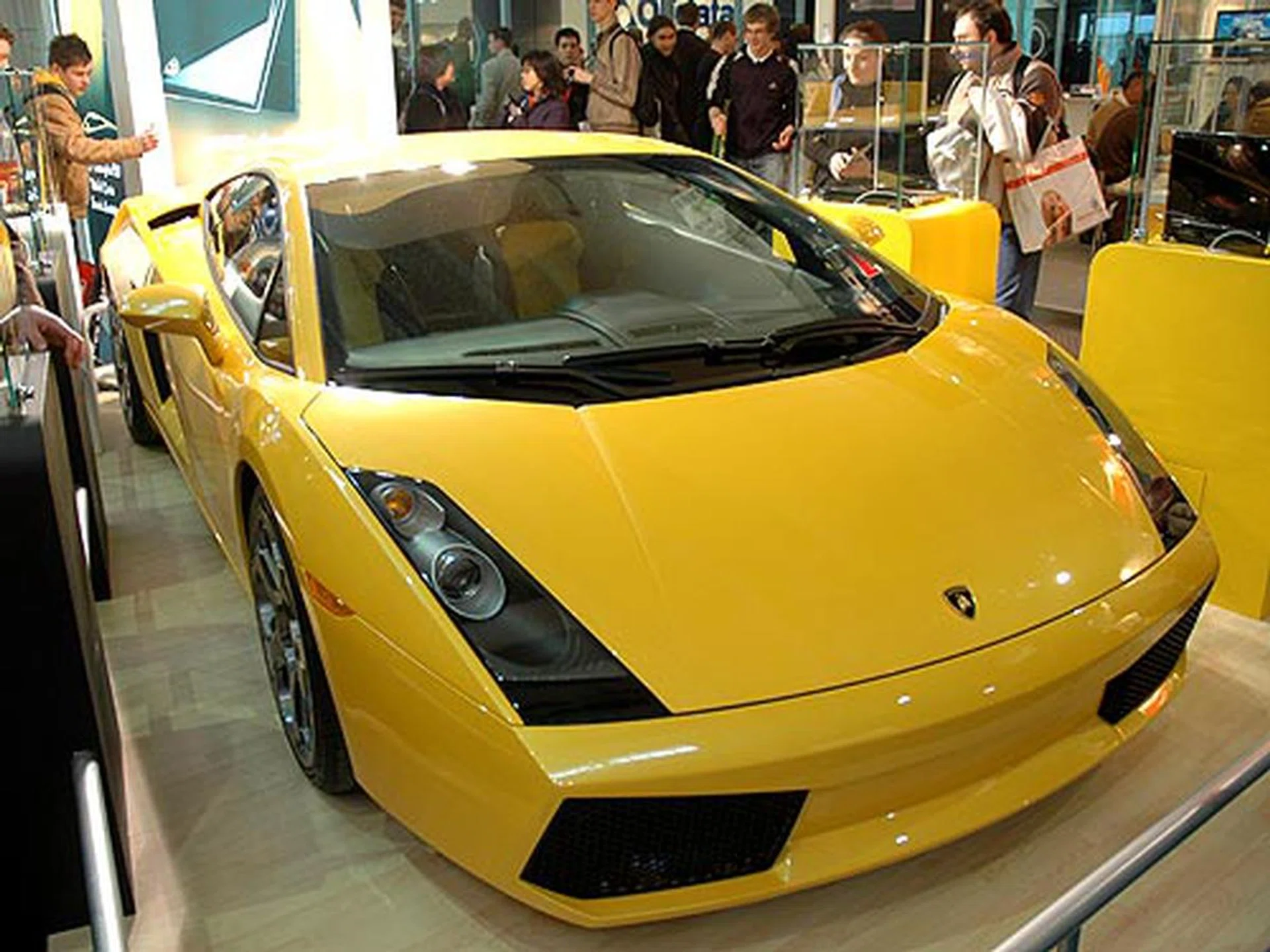 Looks like visitors to ASUS's booth were a little more interested in the sports car than the notebook.