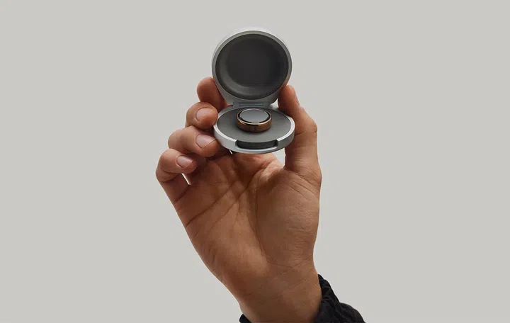 The Oura Ring 5 charging case; the ring itself supports a week of battery life, while the case extends it to a month.