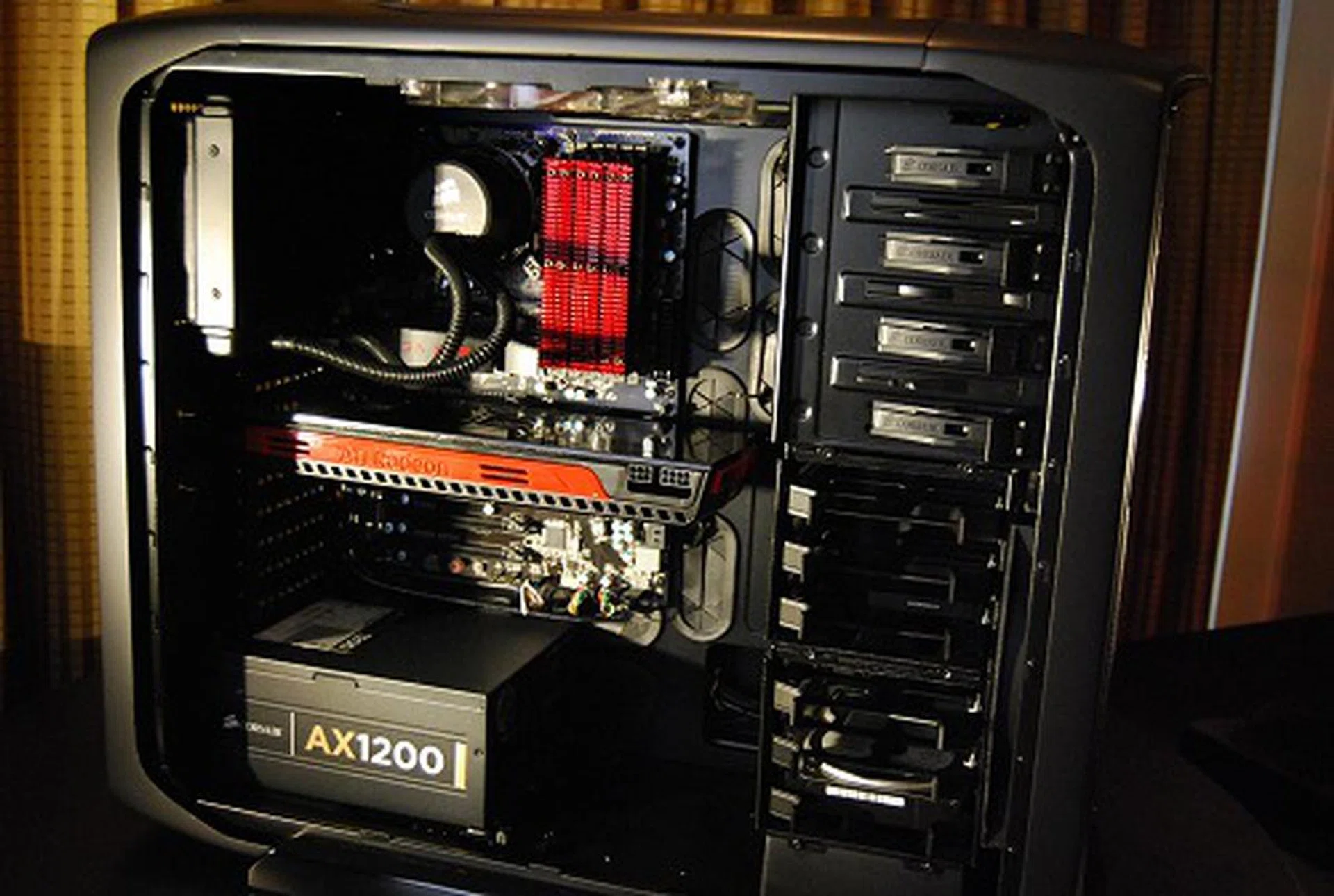 Inside, it looks cavernous and luxurious too. Notice the huge rubber grommets? They are for cable routing to hide some of the unsightly cables on the other side of the motherboard tray. All the drives are easily installed/removed as required.