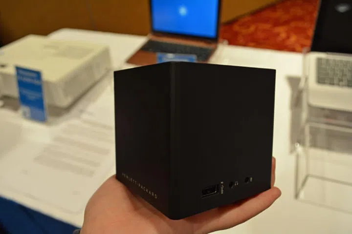 The HP Wireless Docking station is a compact device that can fit into the palm of your hand.