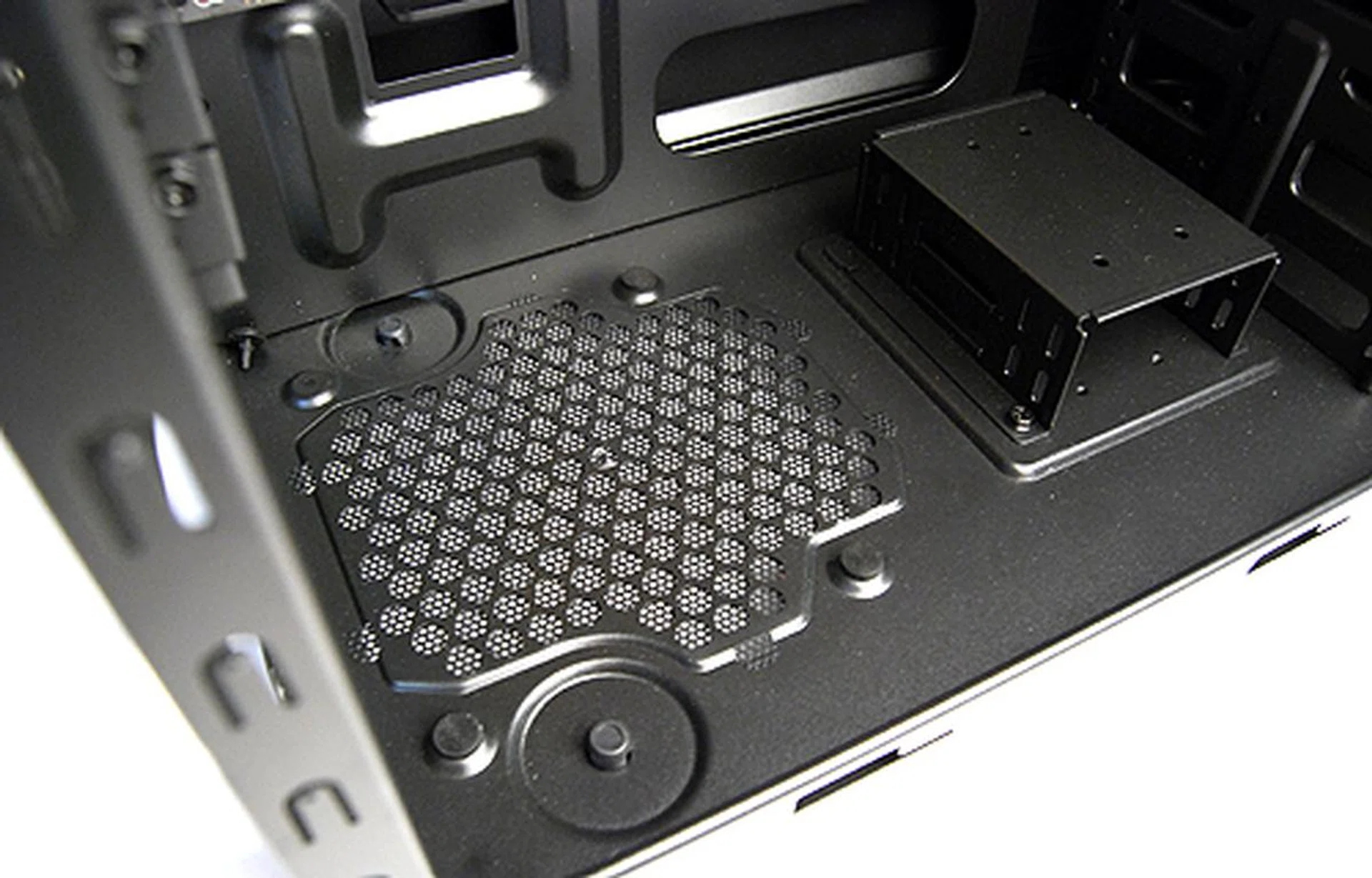 The PSU bay is large enough to accommodate most PSUs and has rubber bits to dampen vibrations.