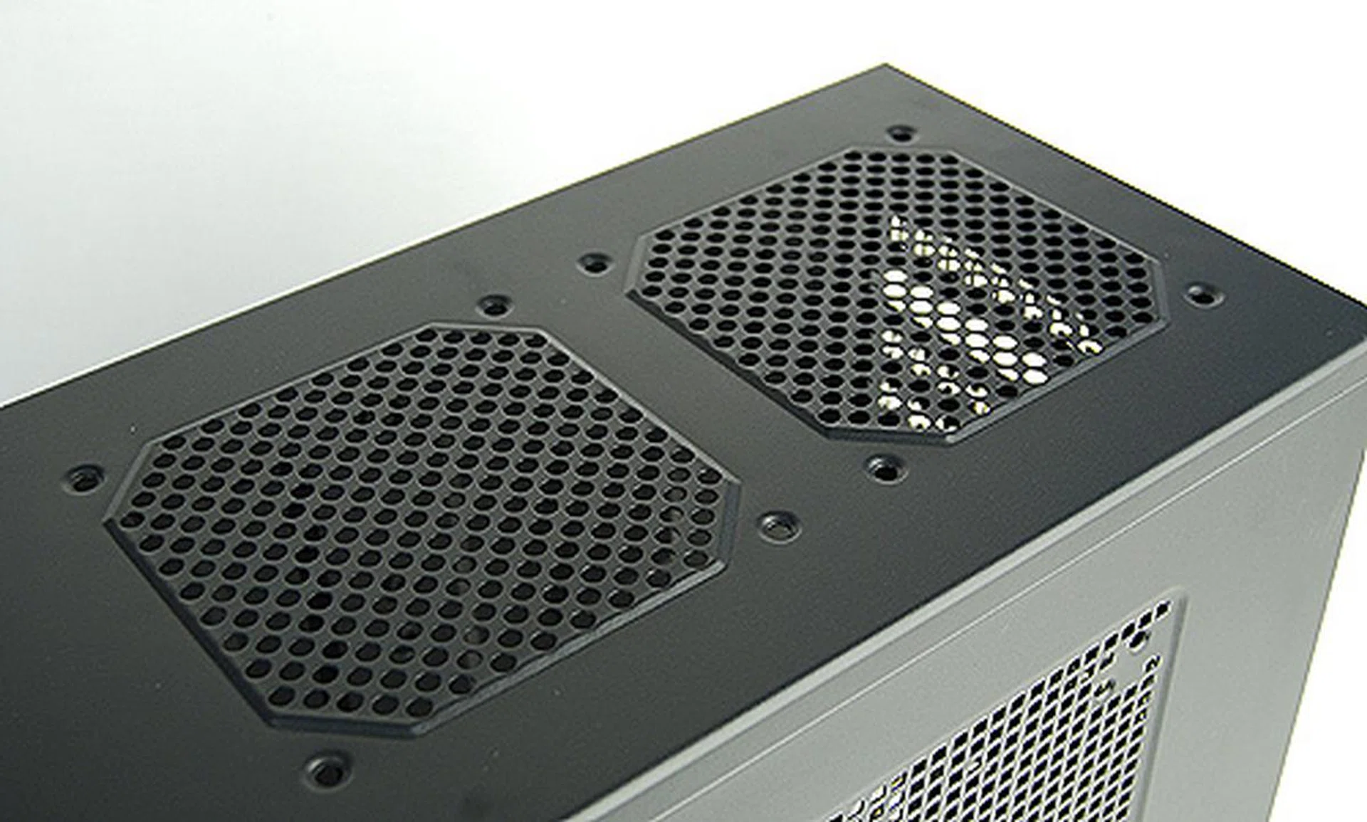 On the top panel there are cutouts to accommodate two 120mm exhaust fans. There's no dust filters however.