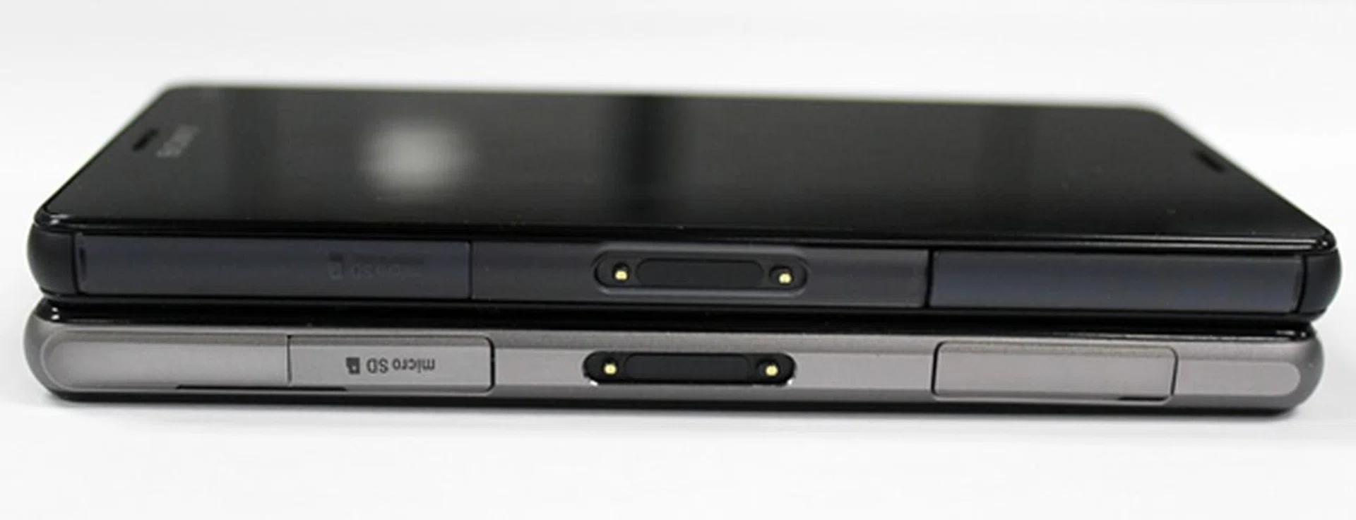 Comparing the right side of the Sony Xperia Z3 Compact (top) and Xperia Z1 Compact (bottom).
