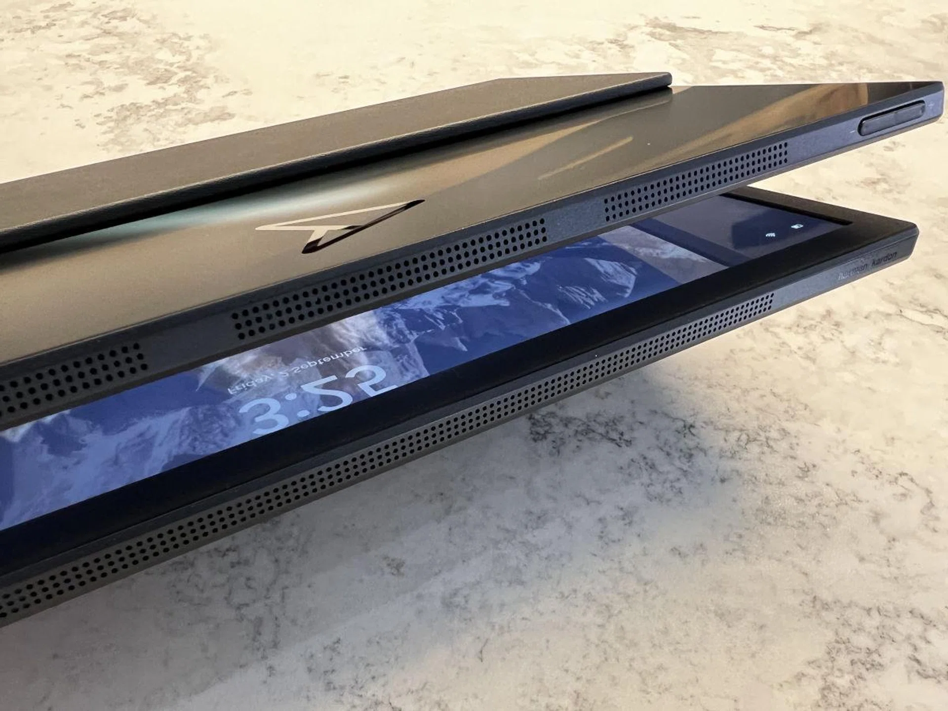 Speaker grills along the top and bottom of the chassis.