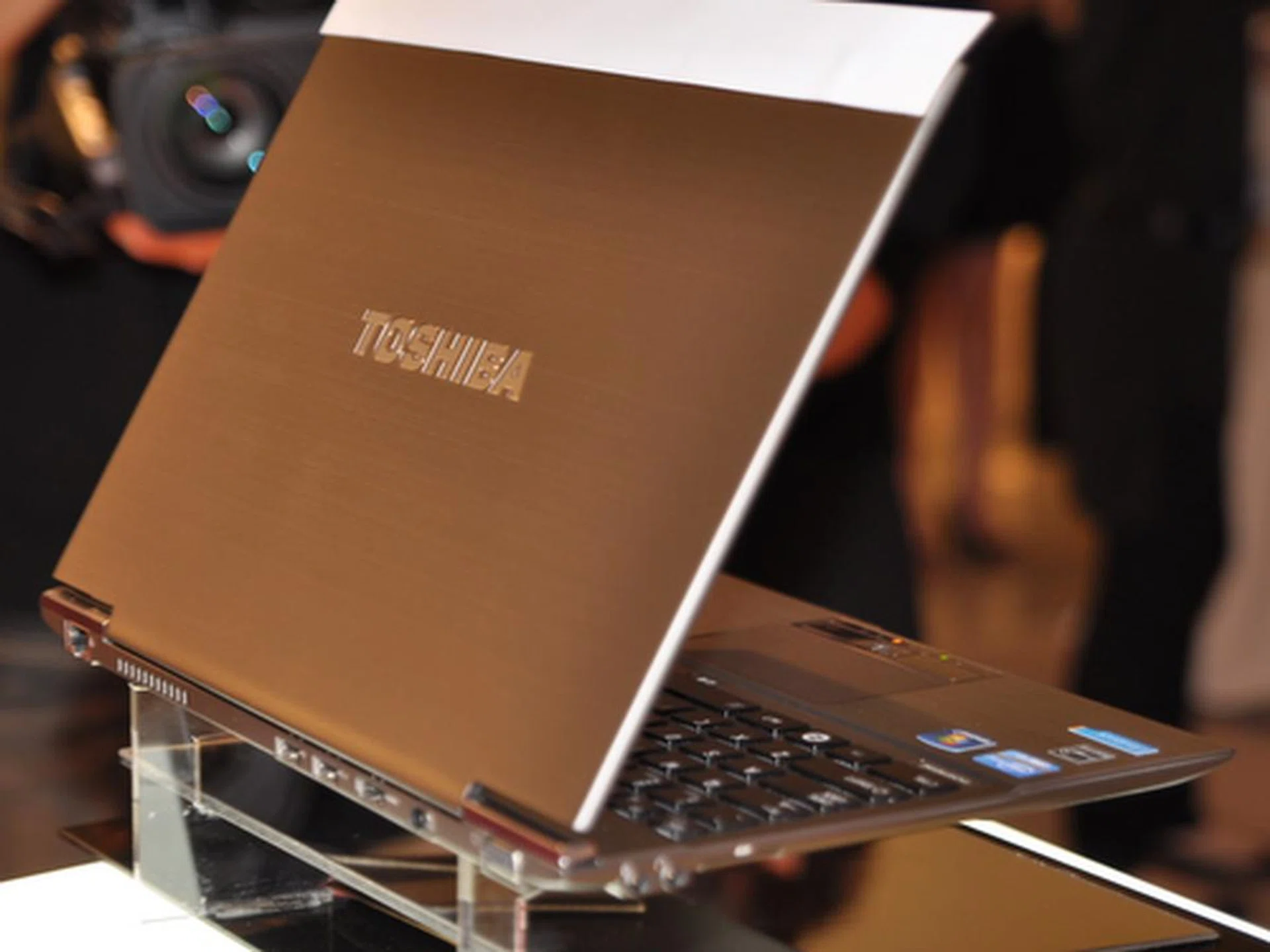 All of the ports you need, like HDMI, VGA, USB ports can be found on the back of the machine. 
