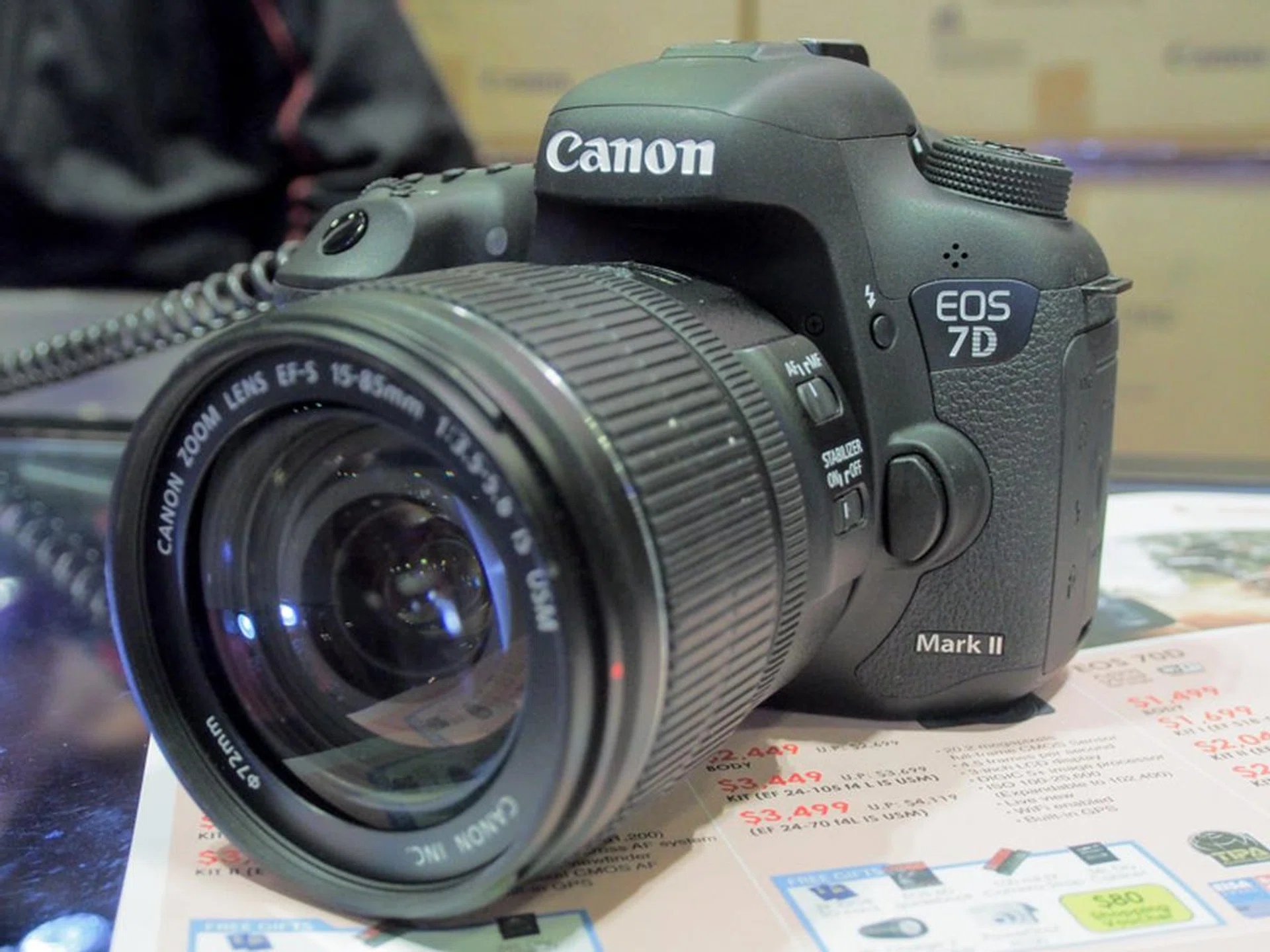 The EOS 7D MKII is a 20.2-megapixel APS-C DSLR that shoots at up to 10 frames per second. It comes with a $50 shopping voucher, two 32GB SD cards, a 36L dry cabinet, a JBL Charge 2 wireless speaker, and a 100mil EF camera strap. Prices start from $2,499 (body only) and go to $3,499 (with EF S15-85 IS USM kit lens).