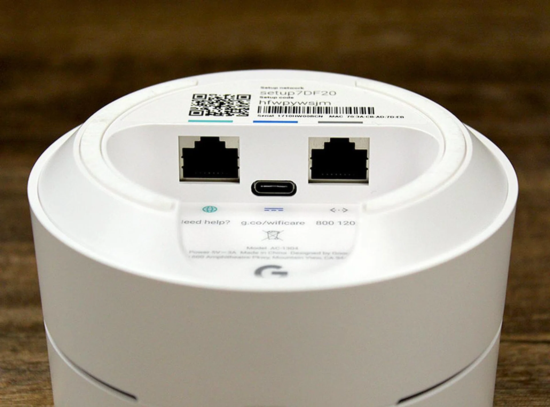 Underneath each node are two Gigabit Ethernet ports - one for WAN and the other for LAN. Power is delivered through a USB Type-C port.