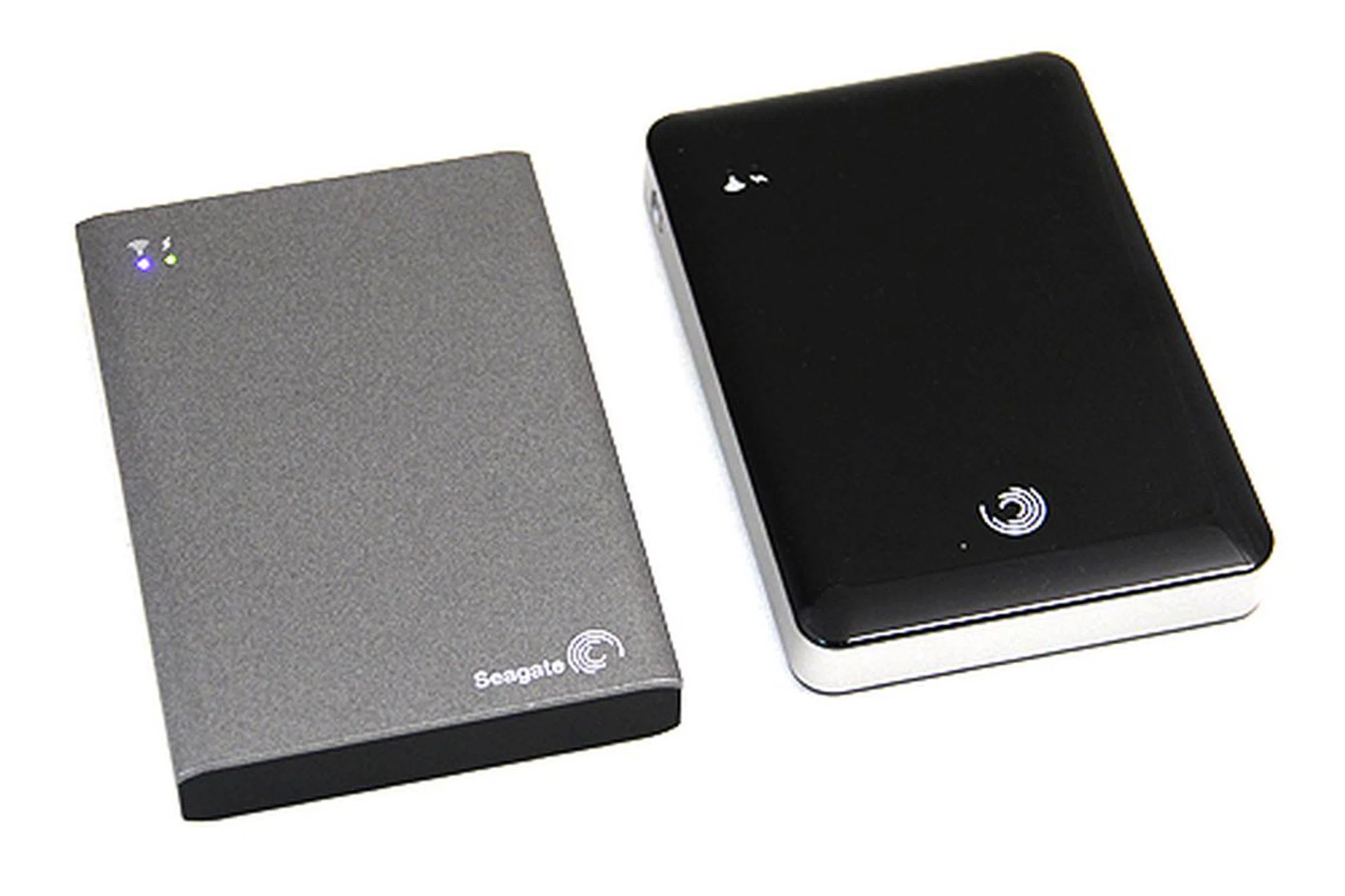 On the left is the new Seagate Wireless Plus and on the right is the older GoFlex Satellite.