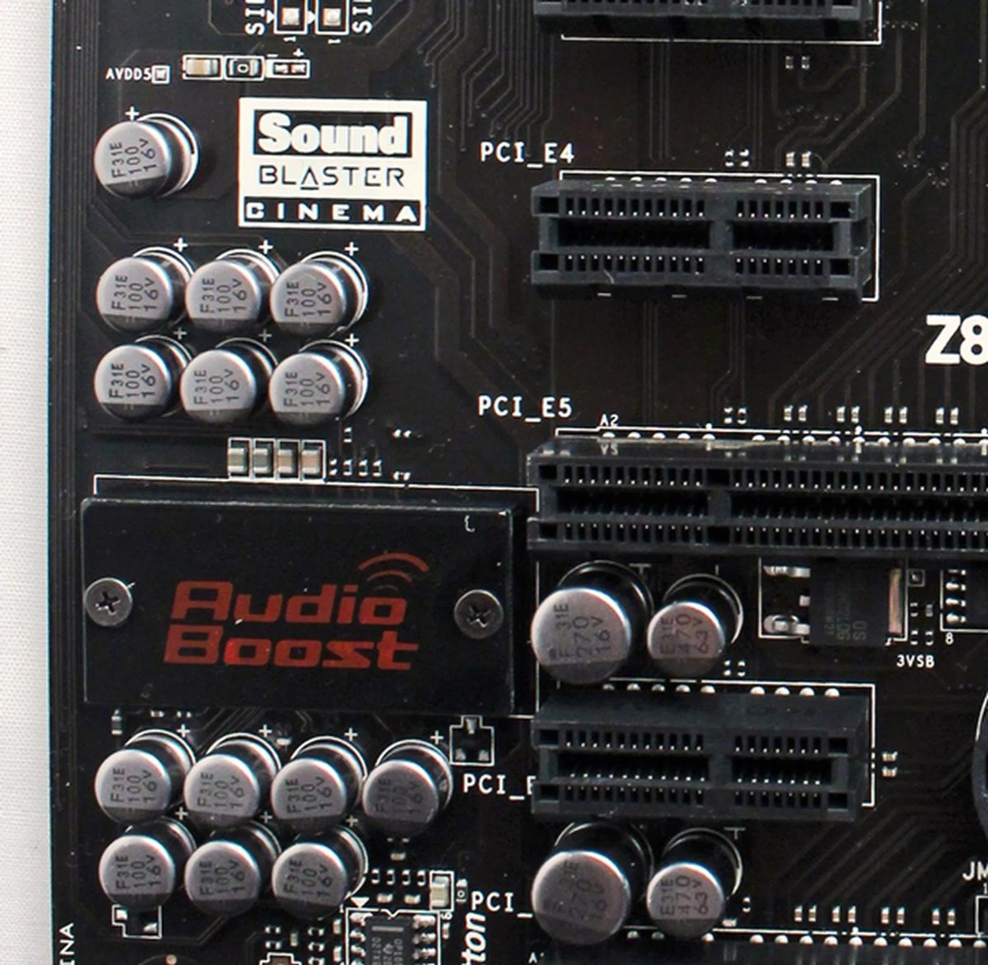 This is the EMI shield for the Realtek CODEC chip and the shield has been emblazoned with the Audio Boost label.