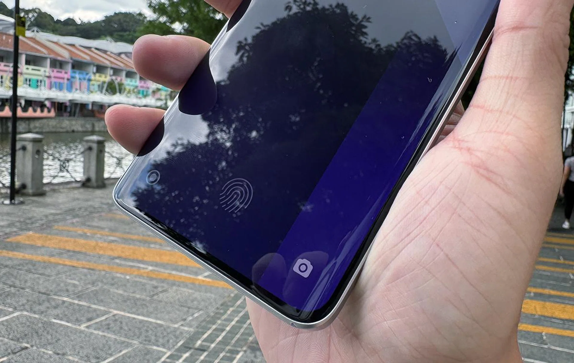 In-display fingerprint sensors are superior to side-mounted ones, not because it has better functionality. It's just less awkward, especially if you're left-handed.