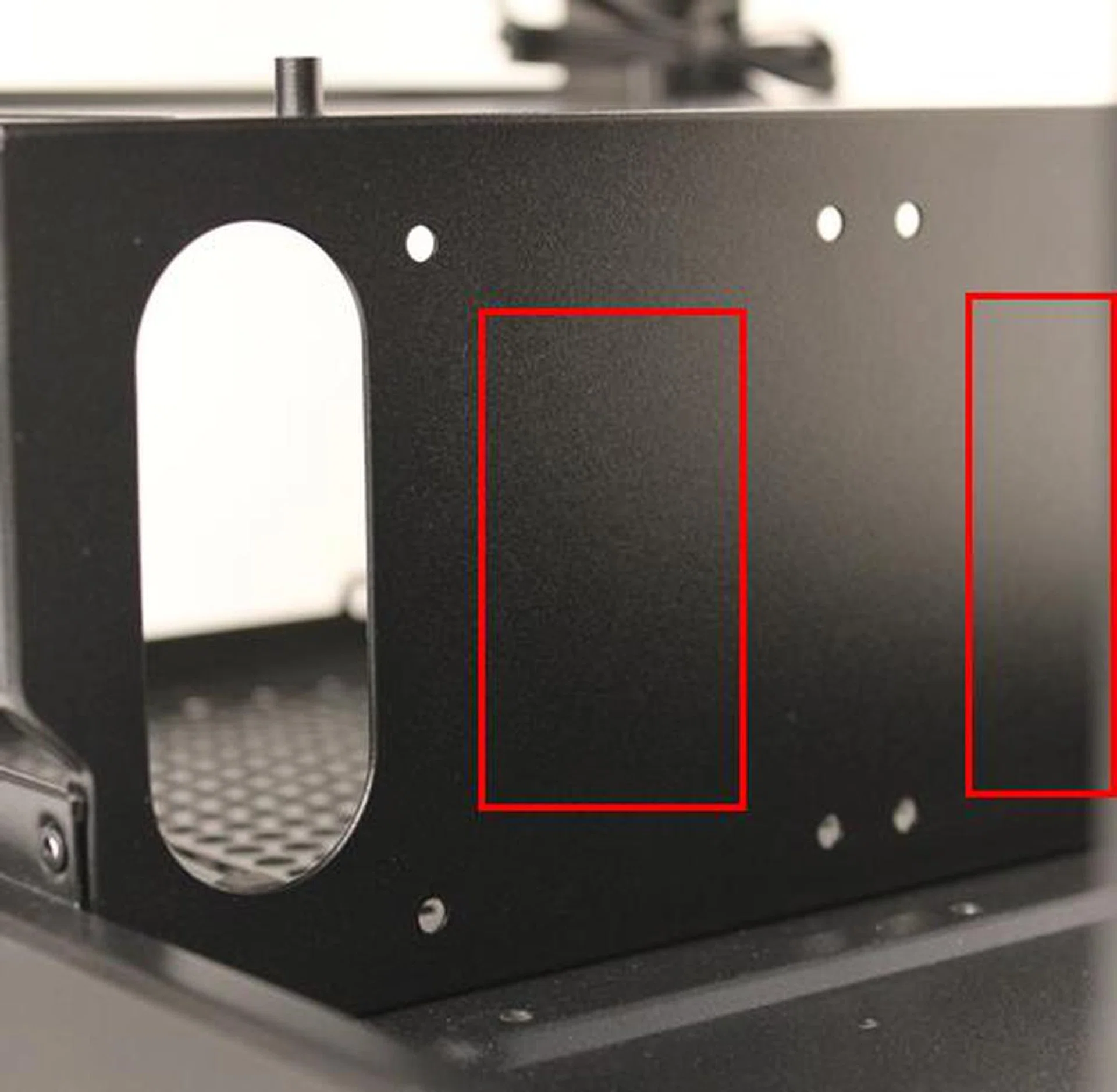 The areas of the PSU cage we have marked out for the possible inclusion of cut-outs for the power cables of any inserted PSU - especially those of depths up to 160mm.