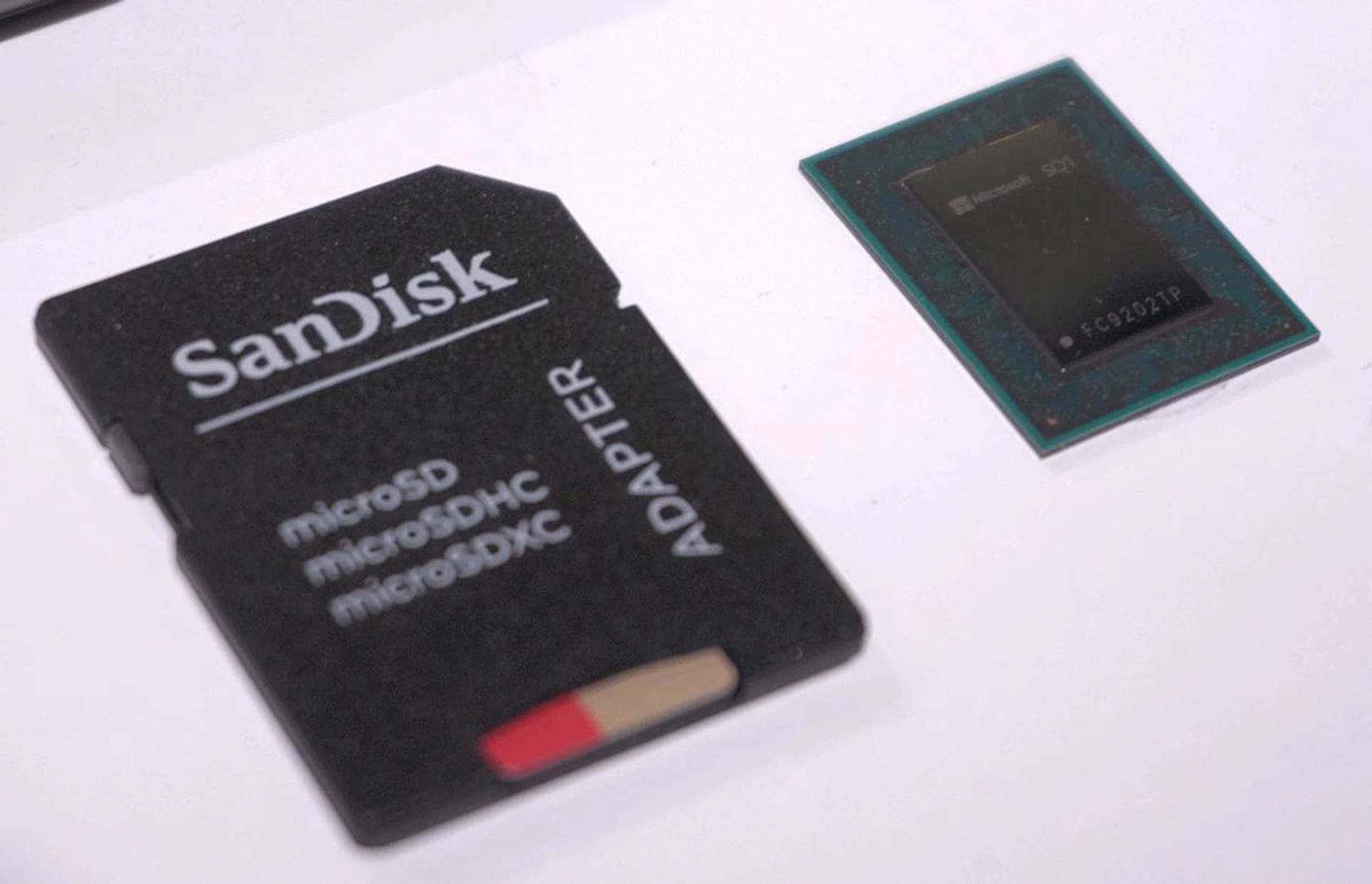 Note the size of the Microsoft SQ1 processor compared to an SD card.
