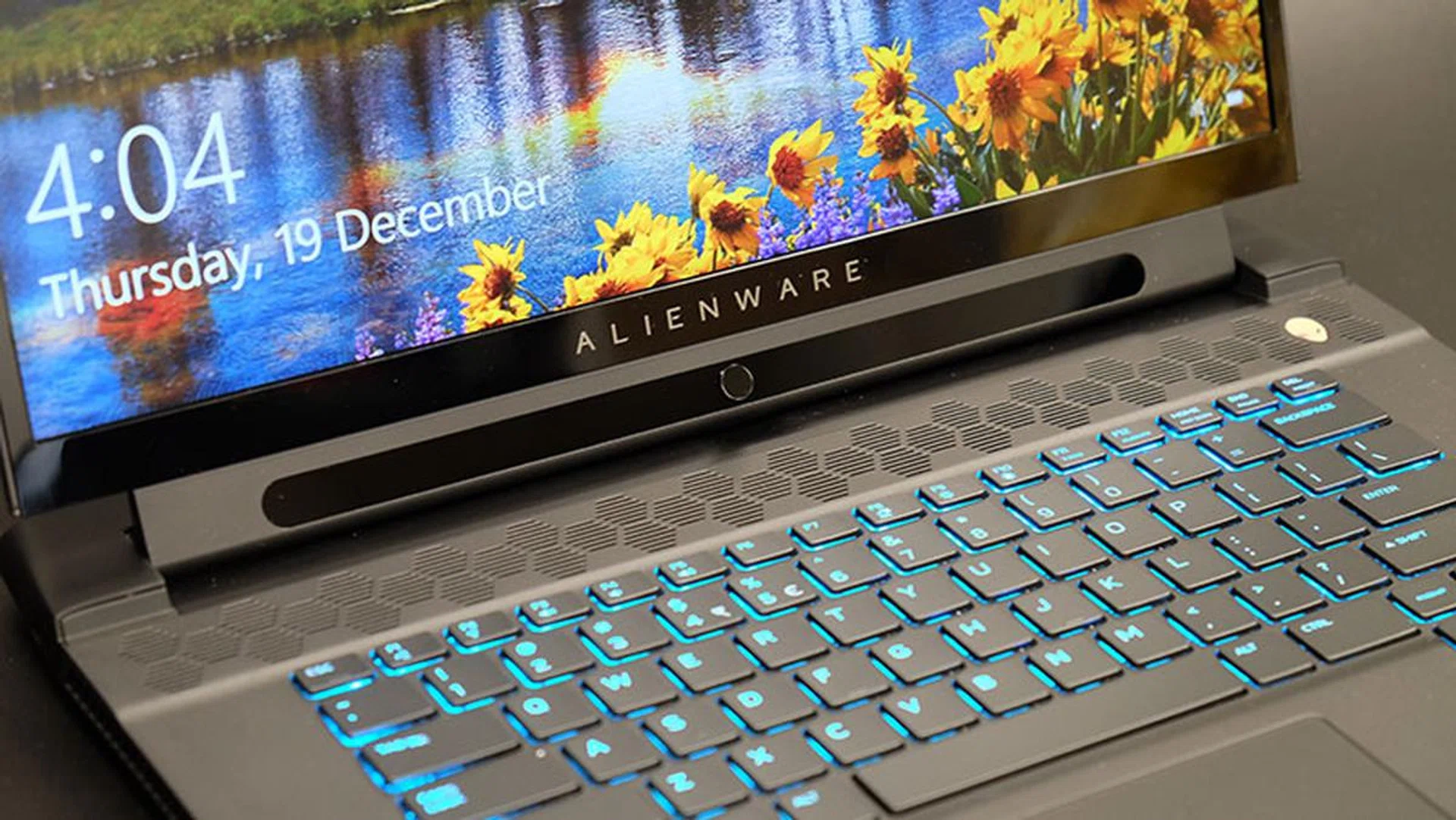 The Tobii eye tracking sensors sit below the Alienware logo. 