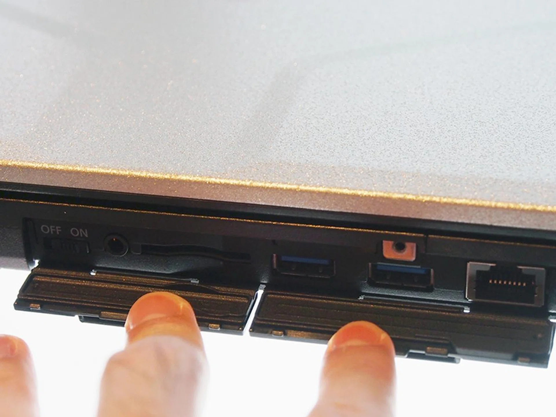 To protect Toughbook CF-54 from dust and liquids, the ports are all hidden behind a cover.