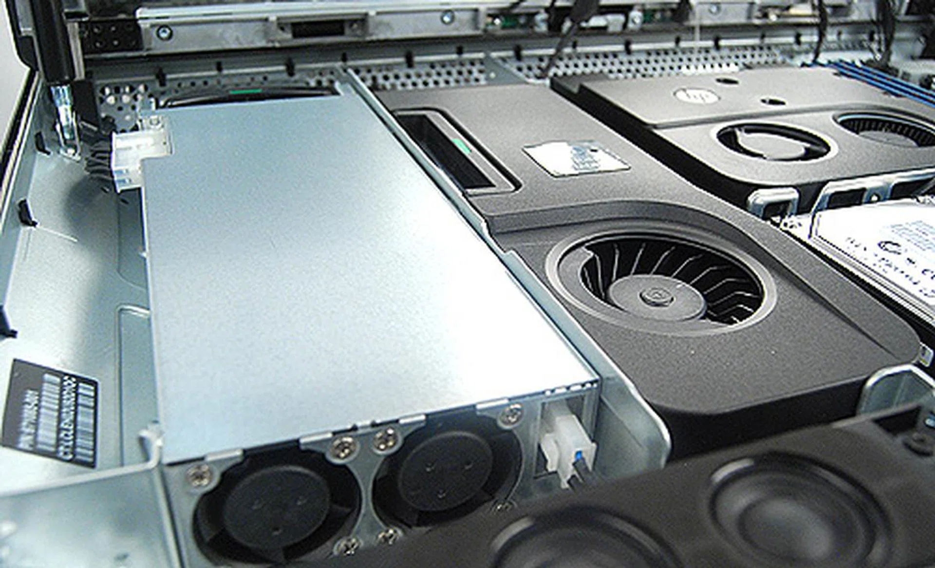 The Quadro 4000M sits right next to the 400W PSU. The Quadro is of a mobile variant, which makes upgrading in future tricky since you can't just buy mobile variants of the Quadro right off the shelf. In fact, it's an MXM module which is shrouded in this custom cooler to look like a regular desktop card.