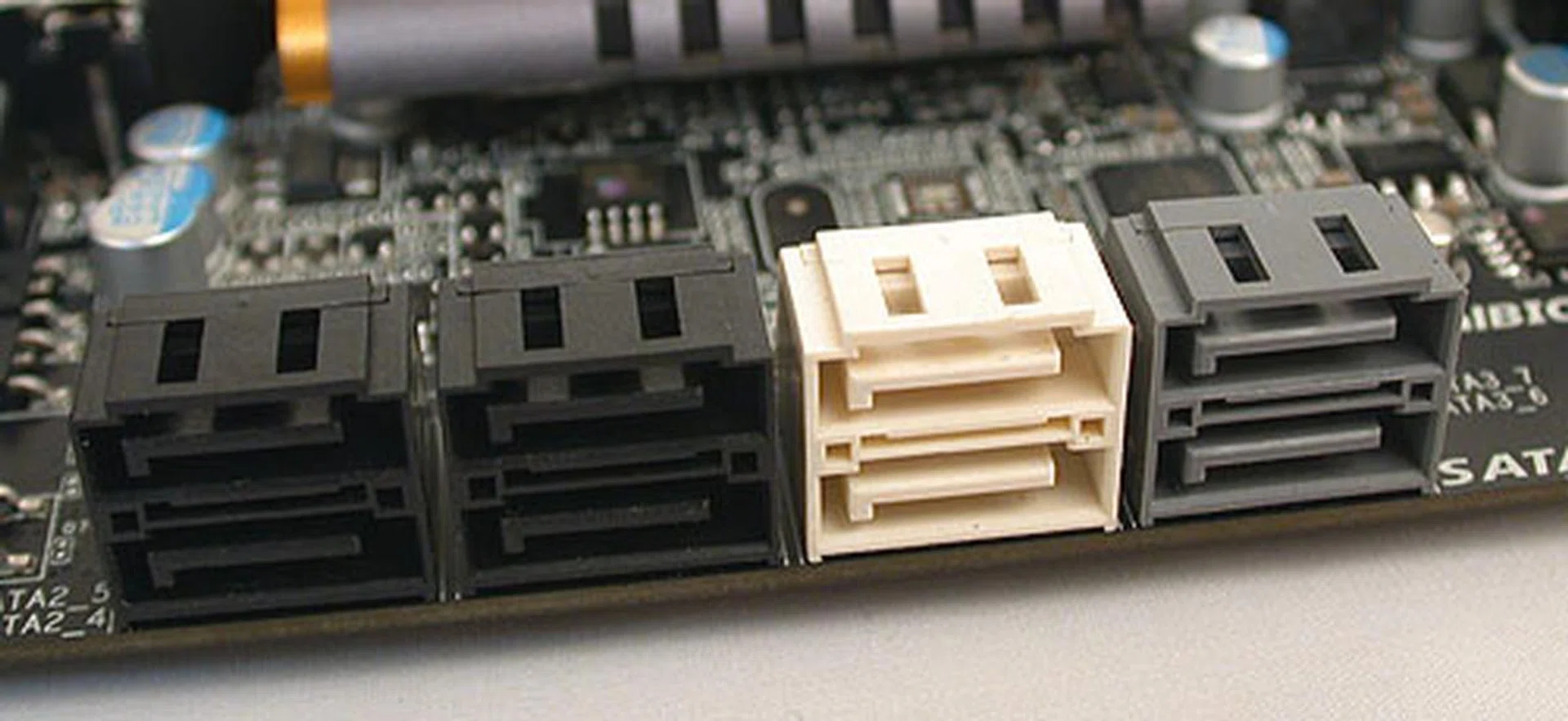 Eight SATA ports should be enough for most users. The four on the left here are SATA 3Gbps ports from the Intel Z68 Express chipset, while the ones in white are SATA 6Gbps versions. The two gray ones are from the Marvell 88SE9128 chip and support SATA 6Gbps speeds.
