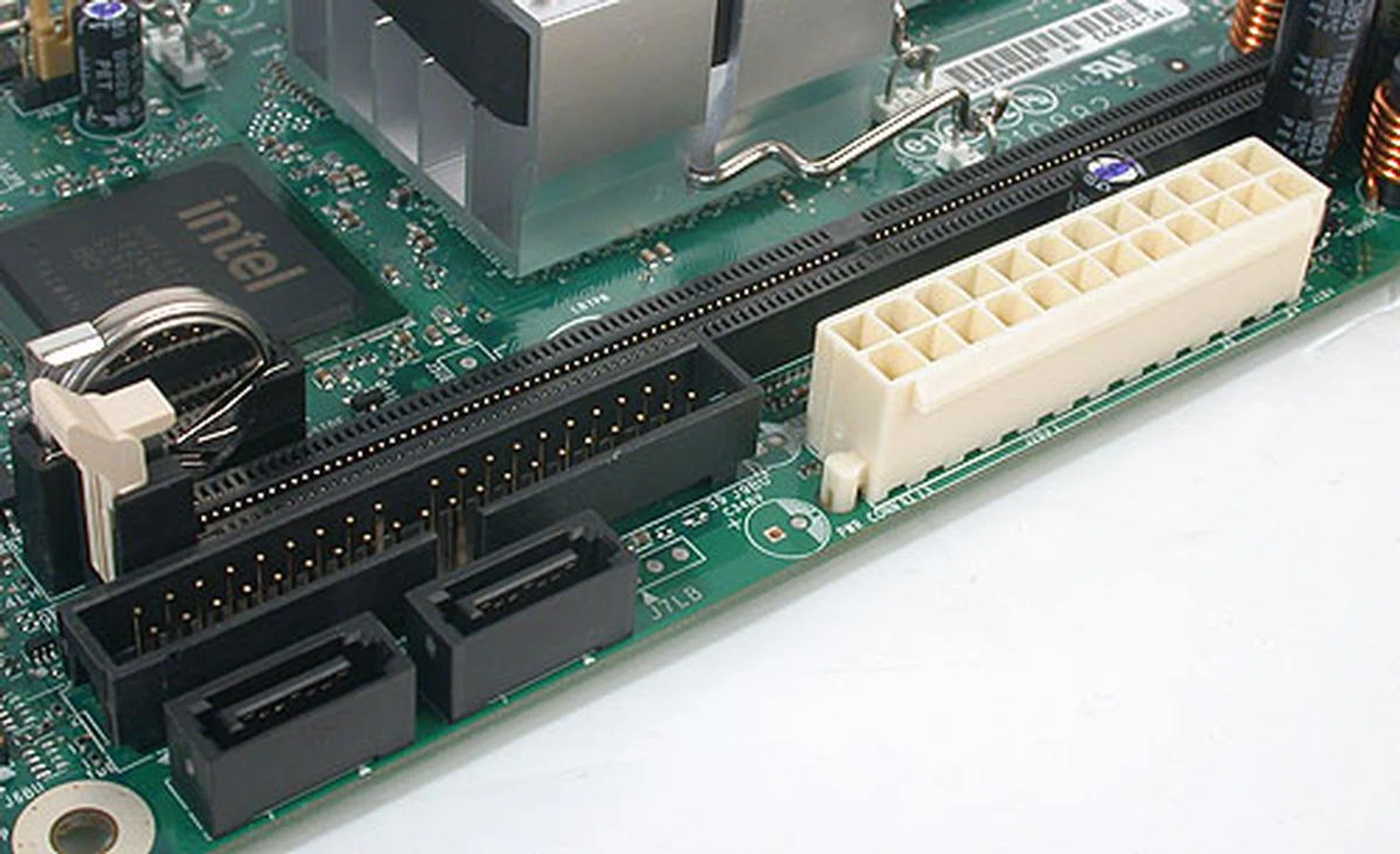 A single DIMM slot for DDR2 memory. The chipset supports only up to DDR2-667, though you can install a single 2GB memory stick here. Two SATA 3.0Gbps ports and an IDE port provide the storage options.