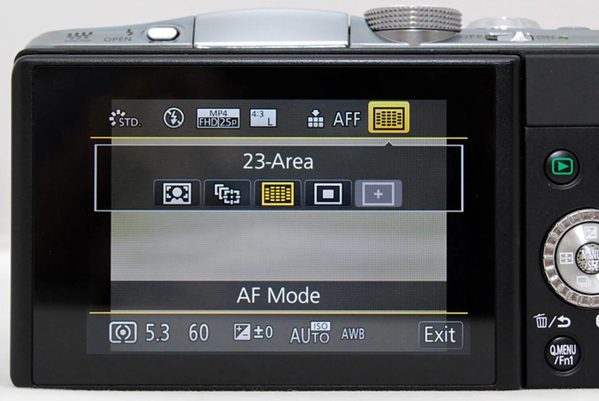 A press of the Q.Menu brings up an overlay menu with quick access to important settings.